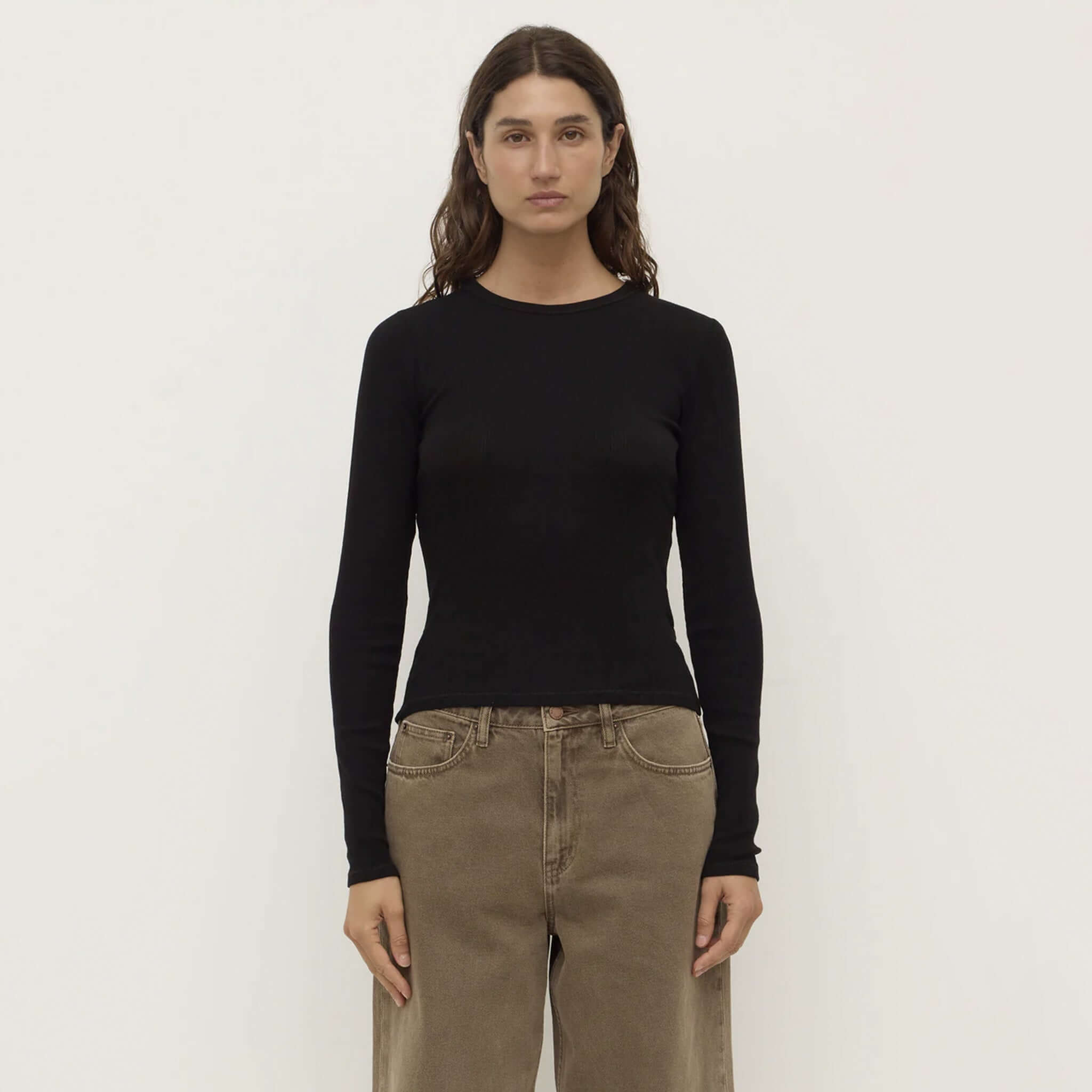 Alt Tag: Assembly Label Zali Long Sleeve Tee - Black ribbed fitted 100% cotton long sleeve top, front view on model