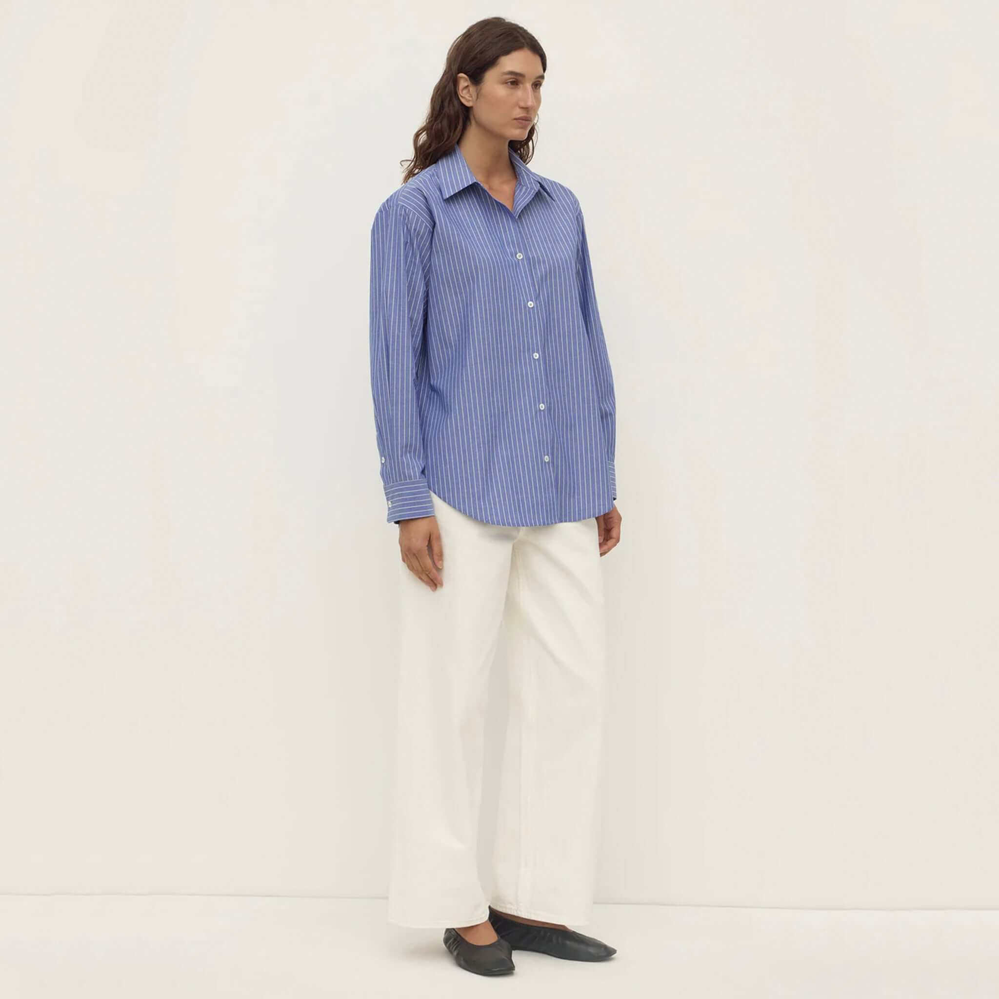 Alt Tag: Assembly Label Anais Stripe Long Sleeve Shirt - Blue & White Stripe on model, cotton button-up with collar, relaxed fit