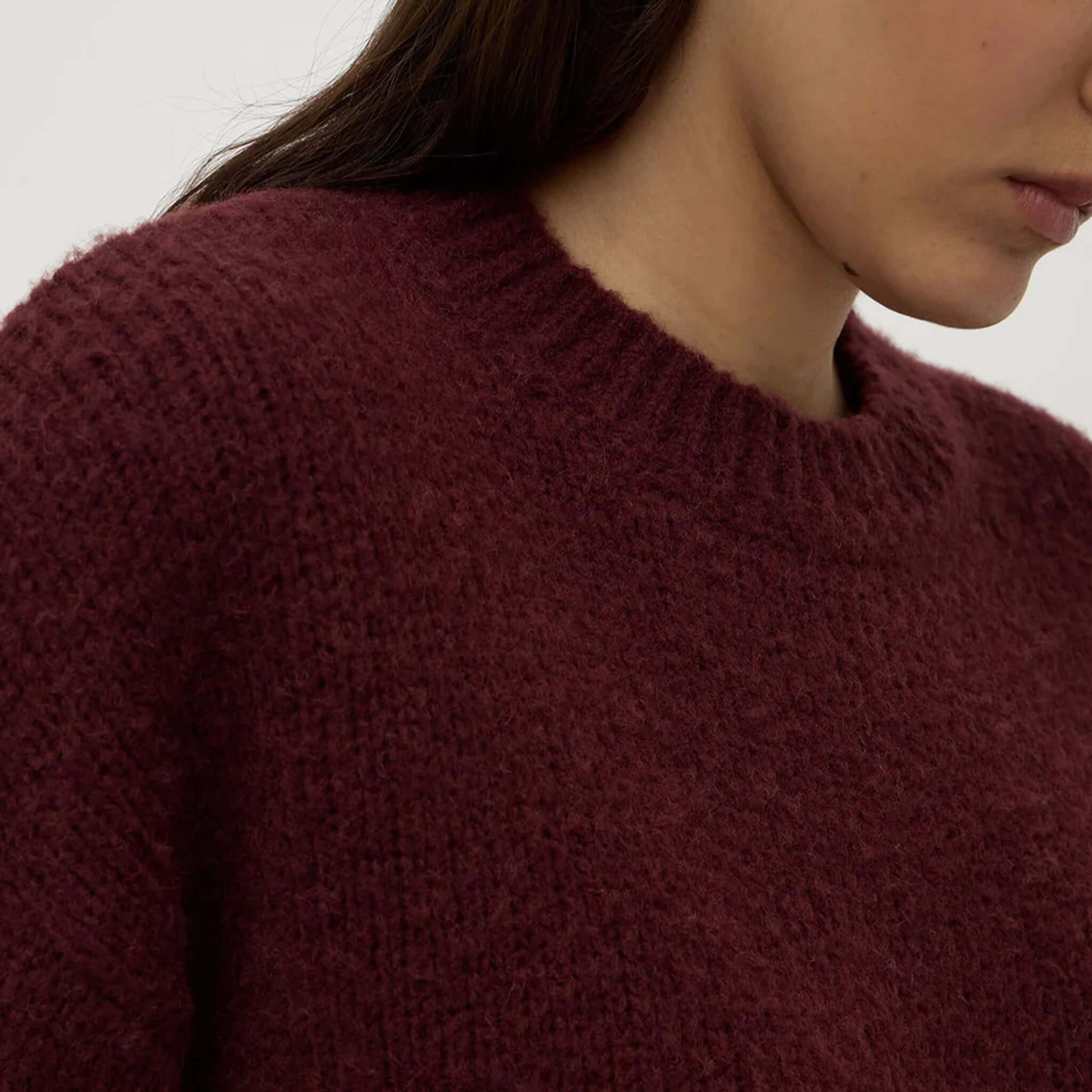 Alt Tag: Assembly Label Ariel Alpaca & Wool Knit Jersey - Merlot close-up of crew neck knit, soft alpaca-wool texture, ribbed neckline