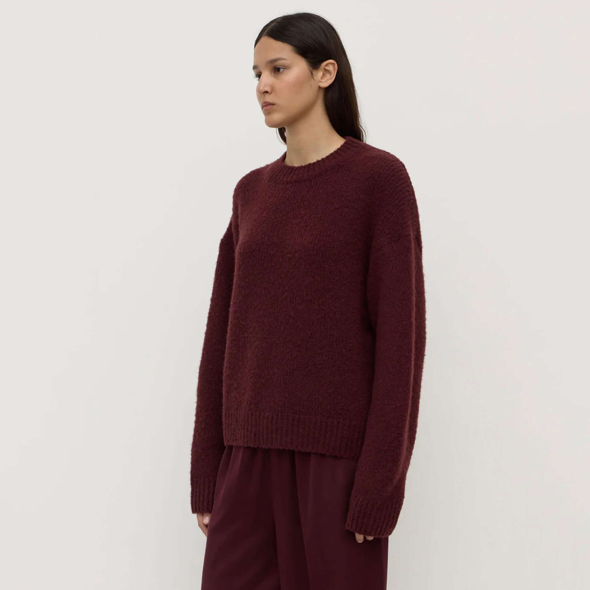 Alt Tag: Assembly Label Ariel Alpaca & Wool Knit Jersey - Merlot crew neck alpaca wool knit sweater, ribbed cuffs and hem, model front view