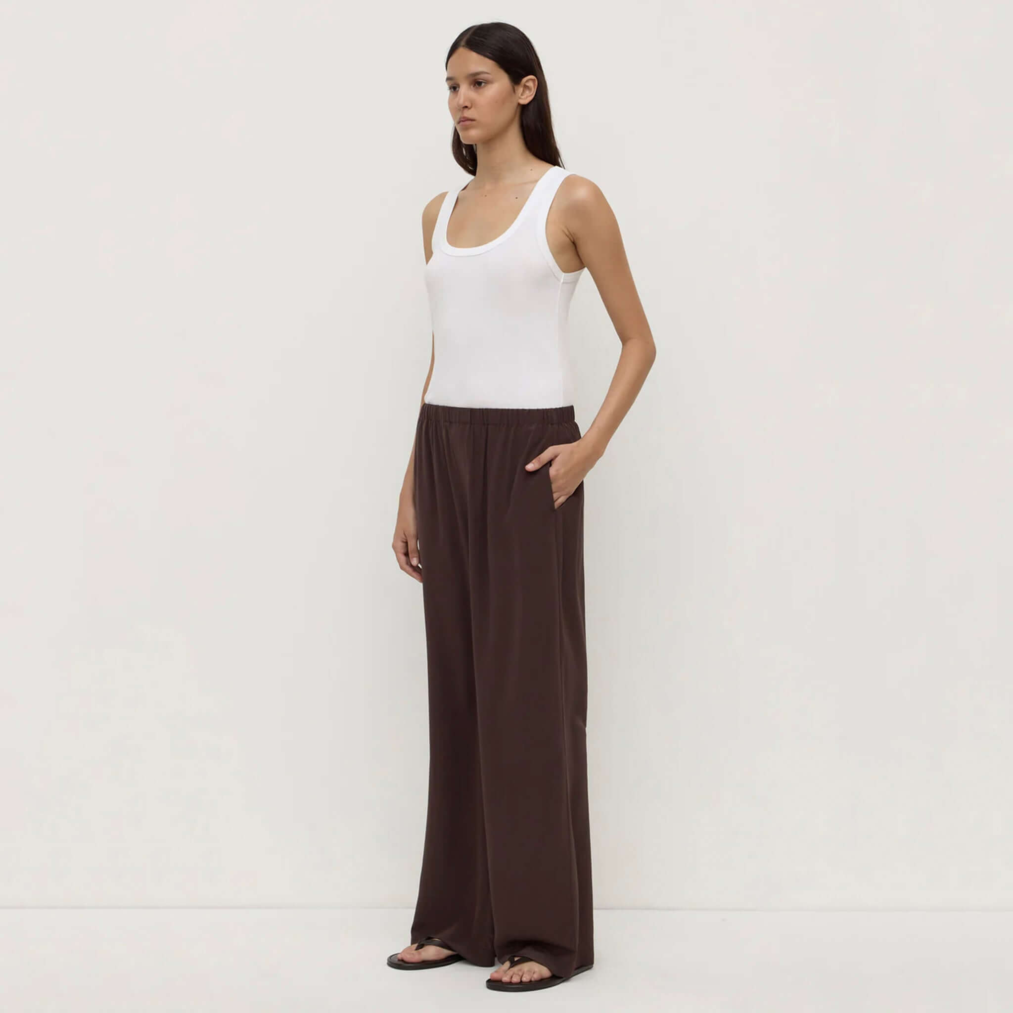 Assembly Label Betty Silk Pants - Ganache relaxed straight-leg lightweight silk pants in ganache brown, worn by model