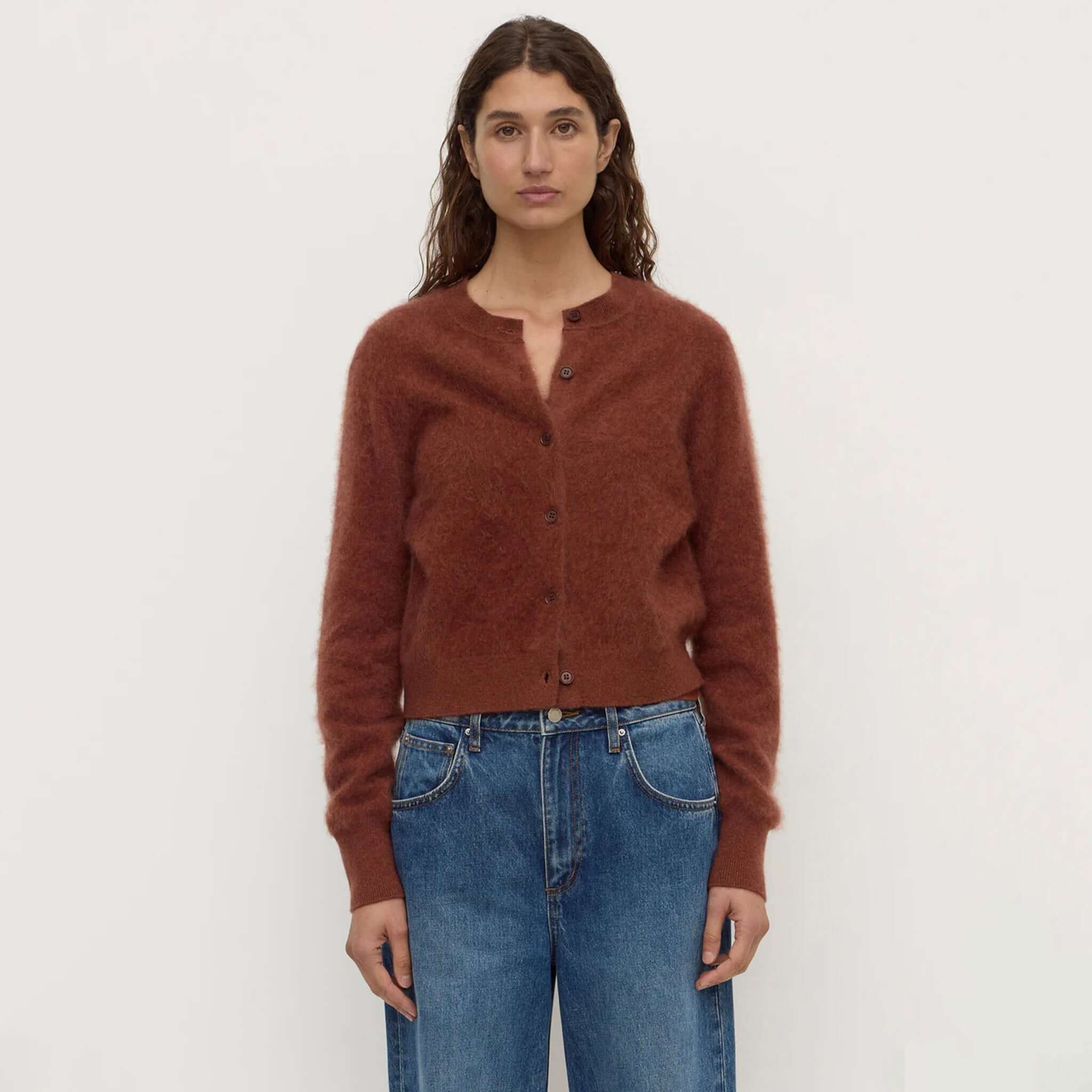 merino wool cardigan Burnt Amber model wearing soft brushed finish, slightly cropped, button front styling.