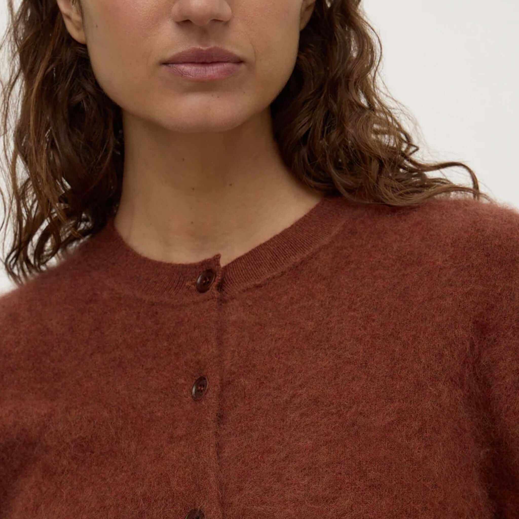 merino wool cardigan Burnt Amber model wearing a soft brushed cardigan with a crew neckline and button front