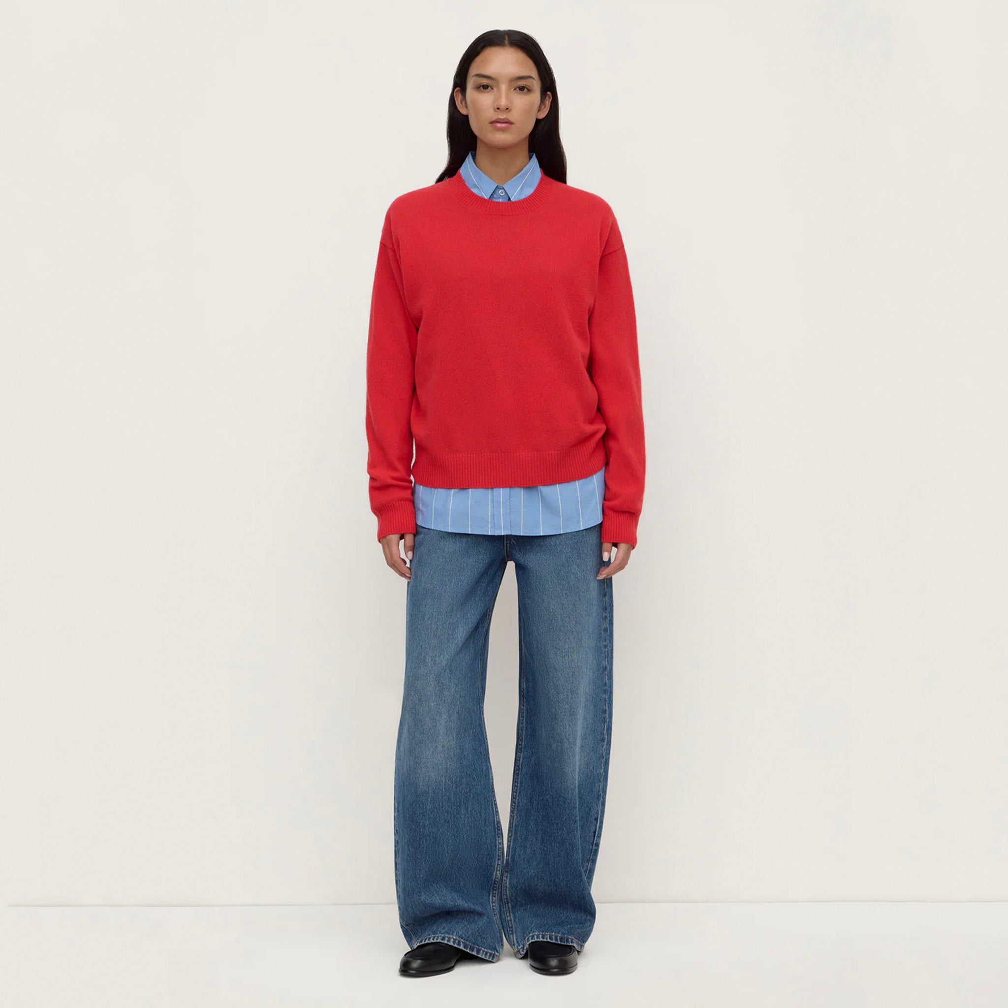 Assembly Label Carter Brushed Merino Wool Sweater - Flame worn with blue shirt and wide-leg jeans.