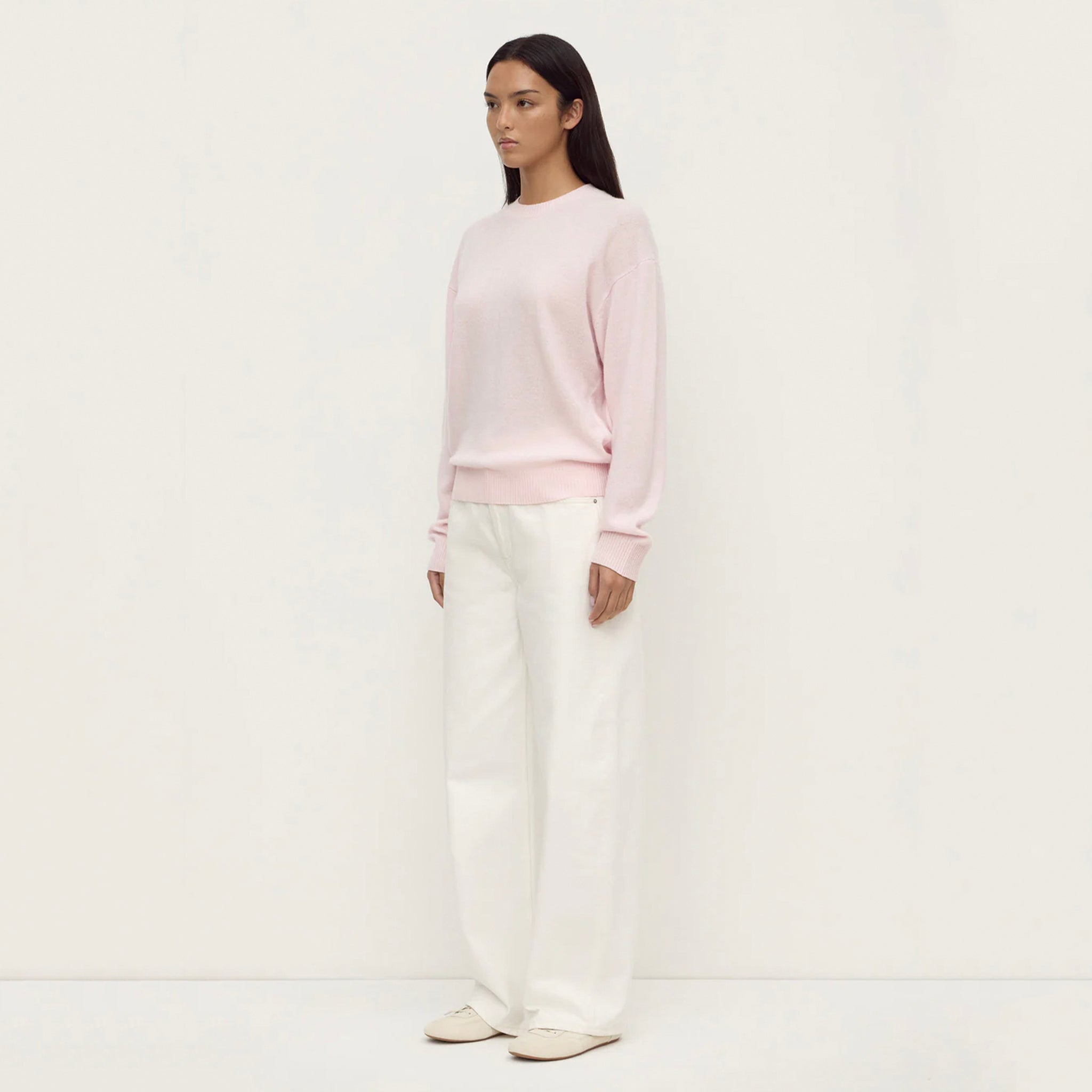 Assembly Label Carter Brushed Merino Wool Sweater - Floss worn by model with white pants.