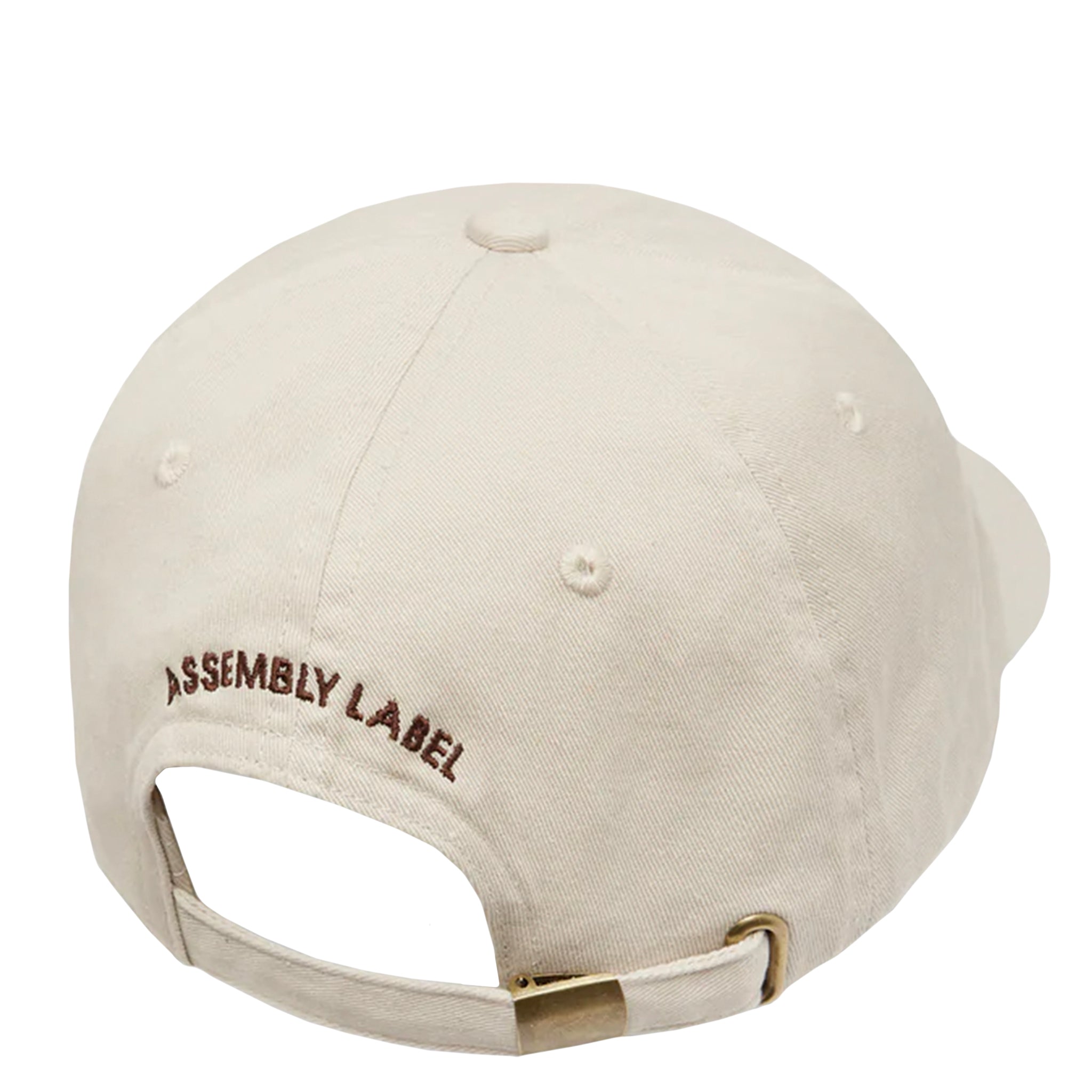 Beige cap with 'Assembly Label' embroidery on a white background