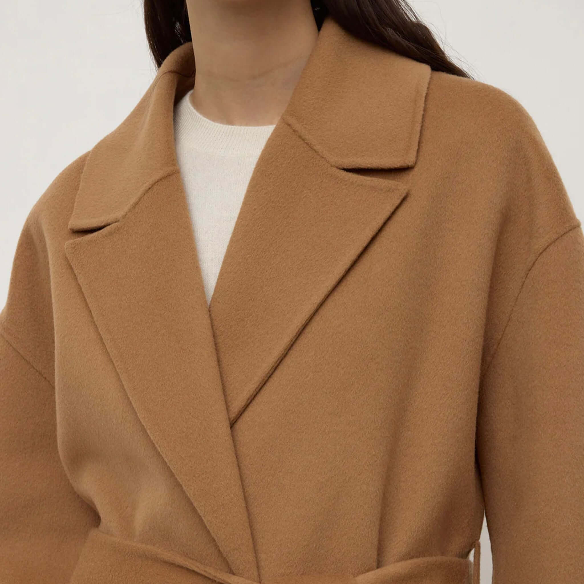 Alt Tag: Assembly Label Ivy Wool Coat - Camel long wool blend winter coat with belted waist and lapel collar, front close-up