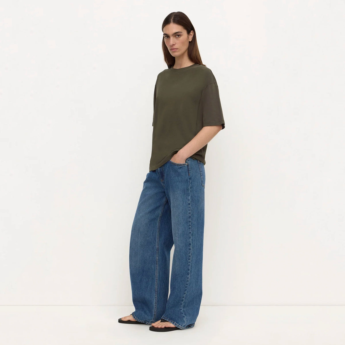 Assembly Label Kira Cotton Hemp Tee - Dark Military, full length side view on model, untucked