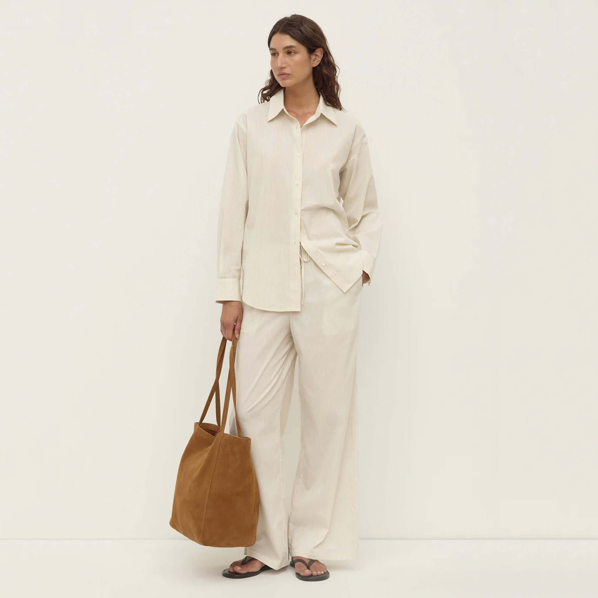 Alt Tag: Assembly Label Marina Stripe Pants - White / Grey Stripe worn by model, relaxed cotton wide-leg pants with elastic waist styling