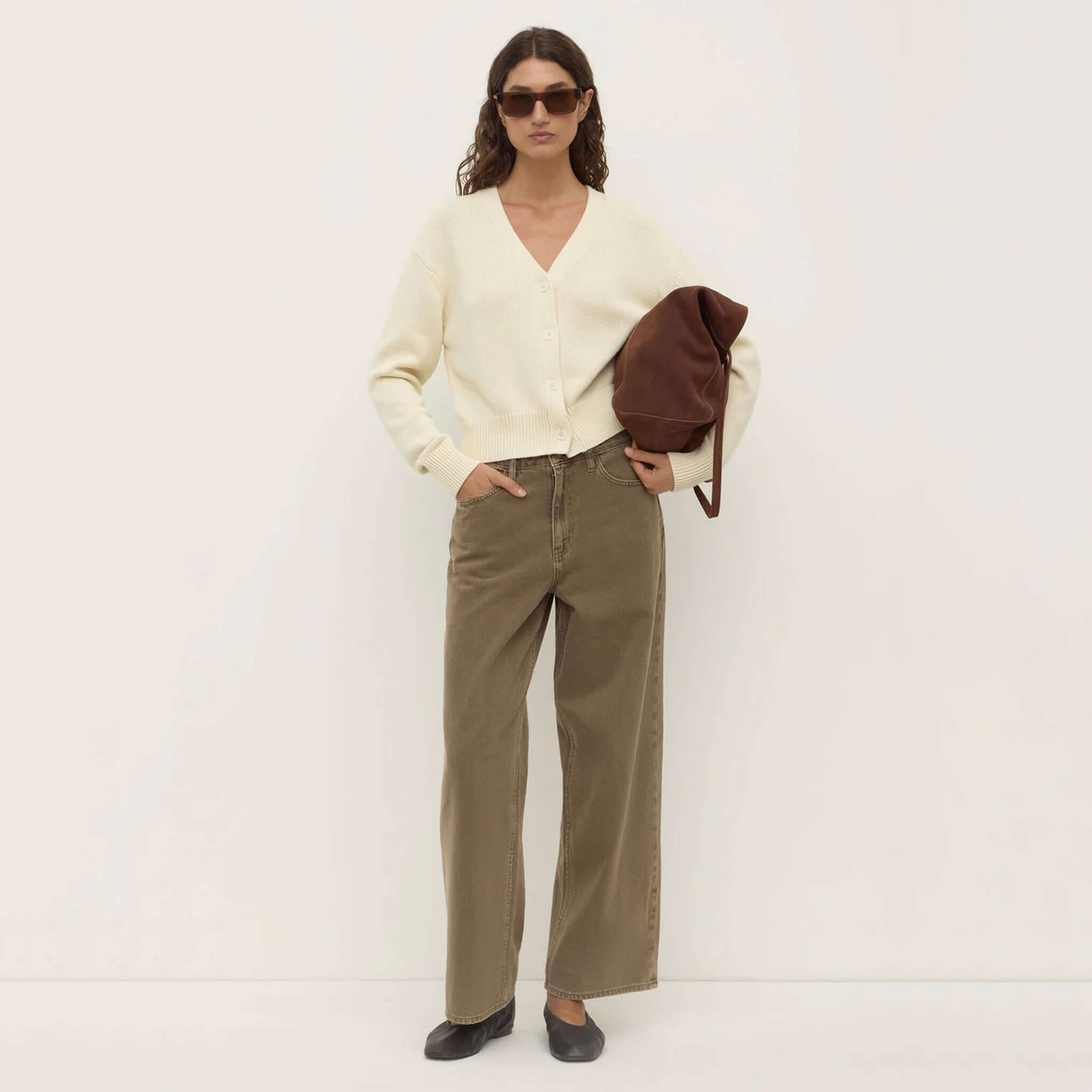 Alt Tag: Assembly Label Meri Cotton Knit Cardigan - Cream on model, V-neck button-front cotton knit layering cardigan in cream