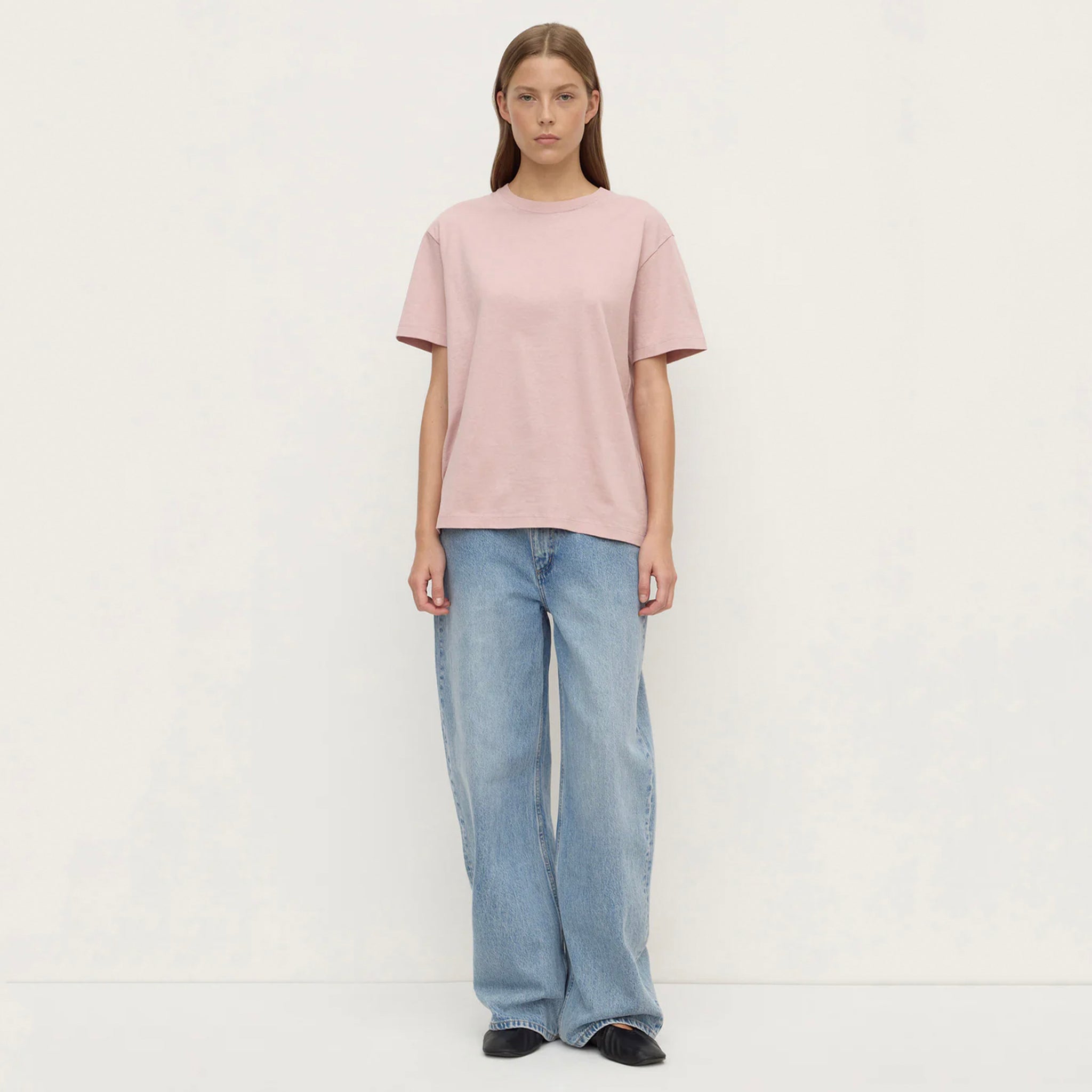 Alt Tag: Assembly Label Organic Cotton Base Tee - Blush on model, relaxed crew neck organic cotton jersey t-shirt in soft blush pink