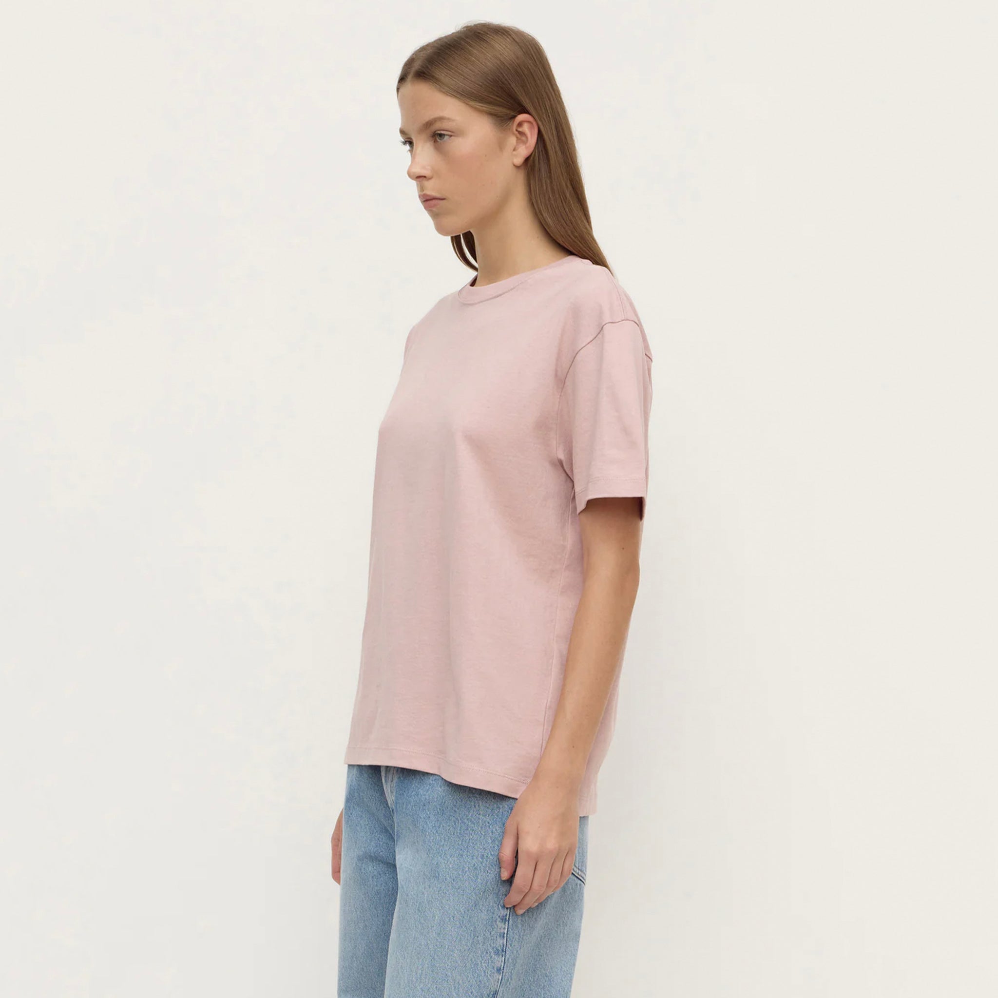 Alt Tag: Assembly Label Organic Cotton Base Tee - Blush on model, relaxed crew neck organic cotton jersey t-shirt in blush pink