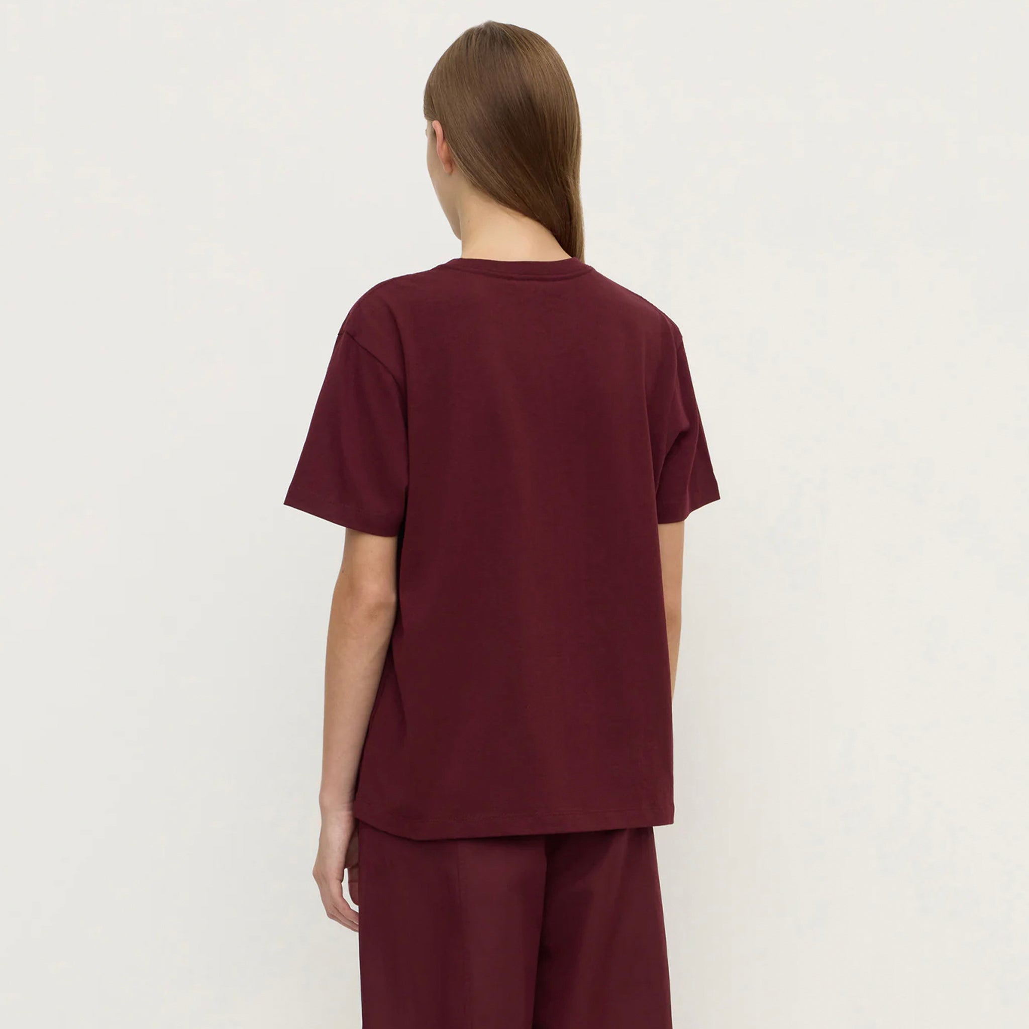 Alt Tag: Assembly Label Organic Cotton Base Tee - Merlot back view, relaxed crew neck organic cotton jersey t-shirt in merlot