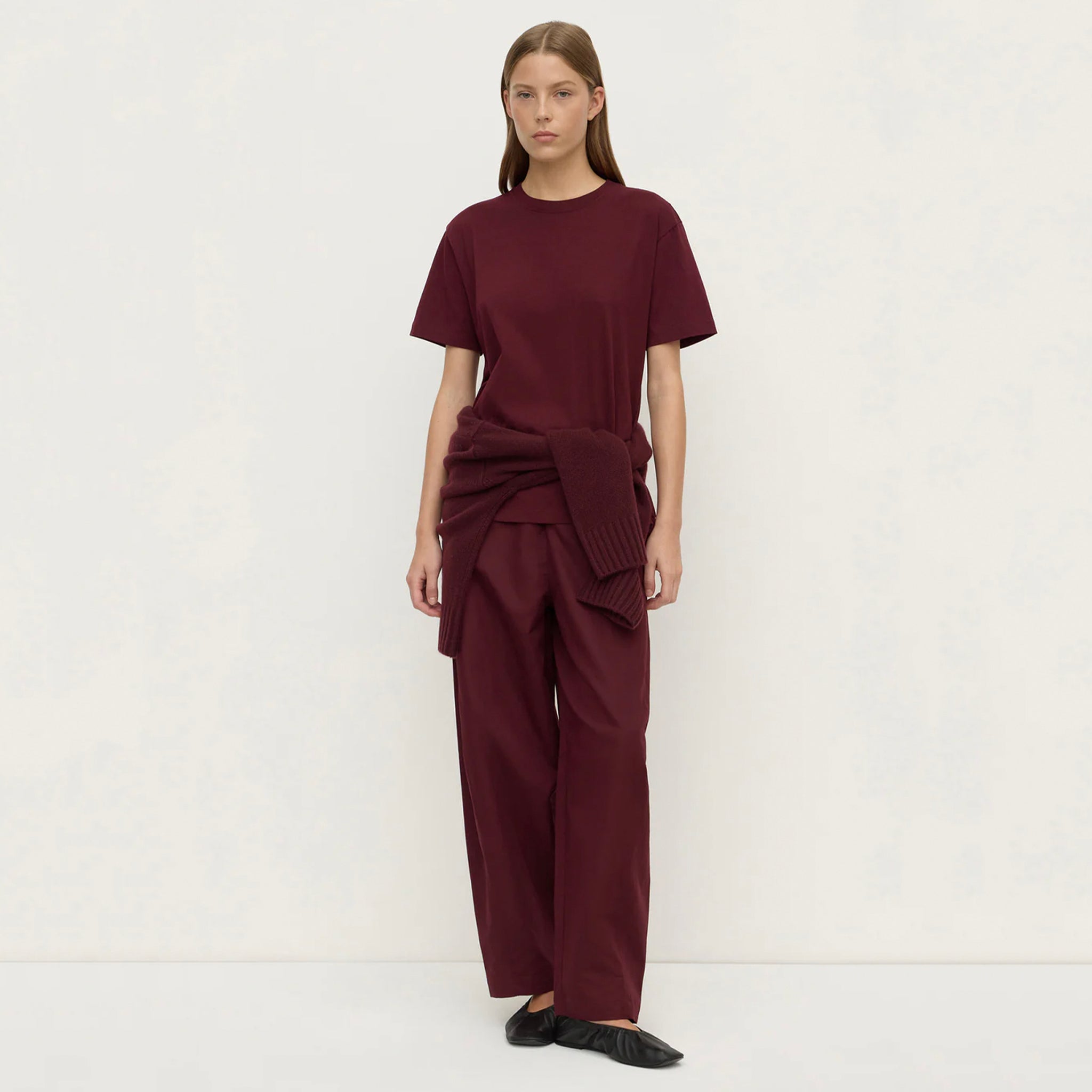 Alt Tag: Assembly Label Organic Cotton Base Tee - Merlot worn by model, relaxed crew neck organic cotton jersey tee in merlot