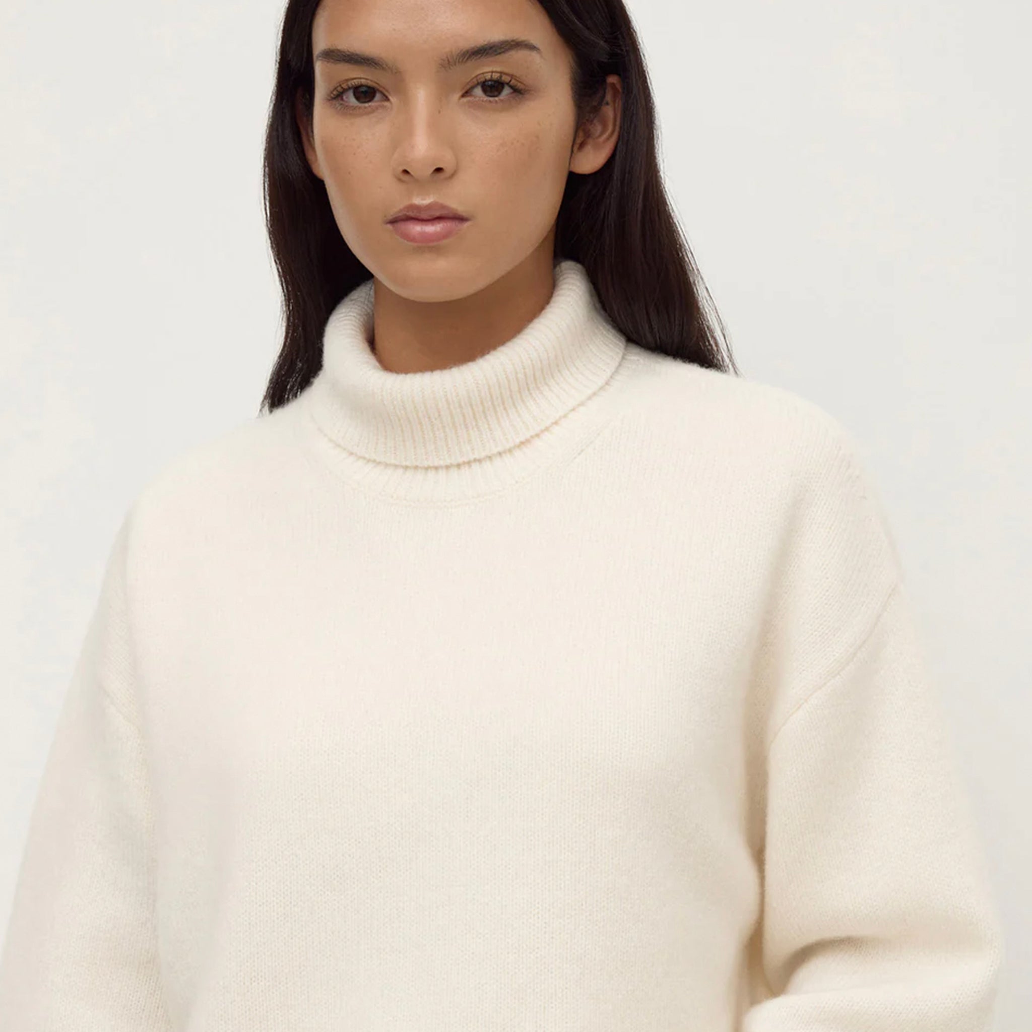 Assembly Label Paris Wool & Cashmere Knit Turtleneck - White model wearing soft white turtleneck sweater