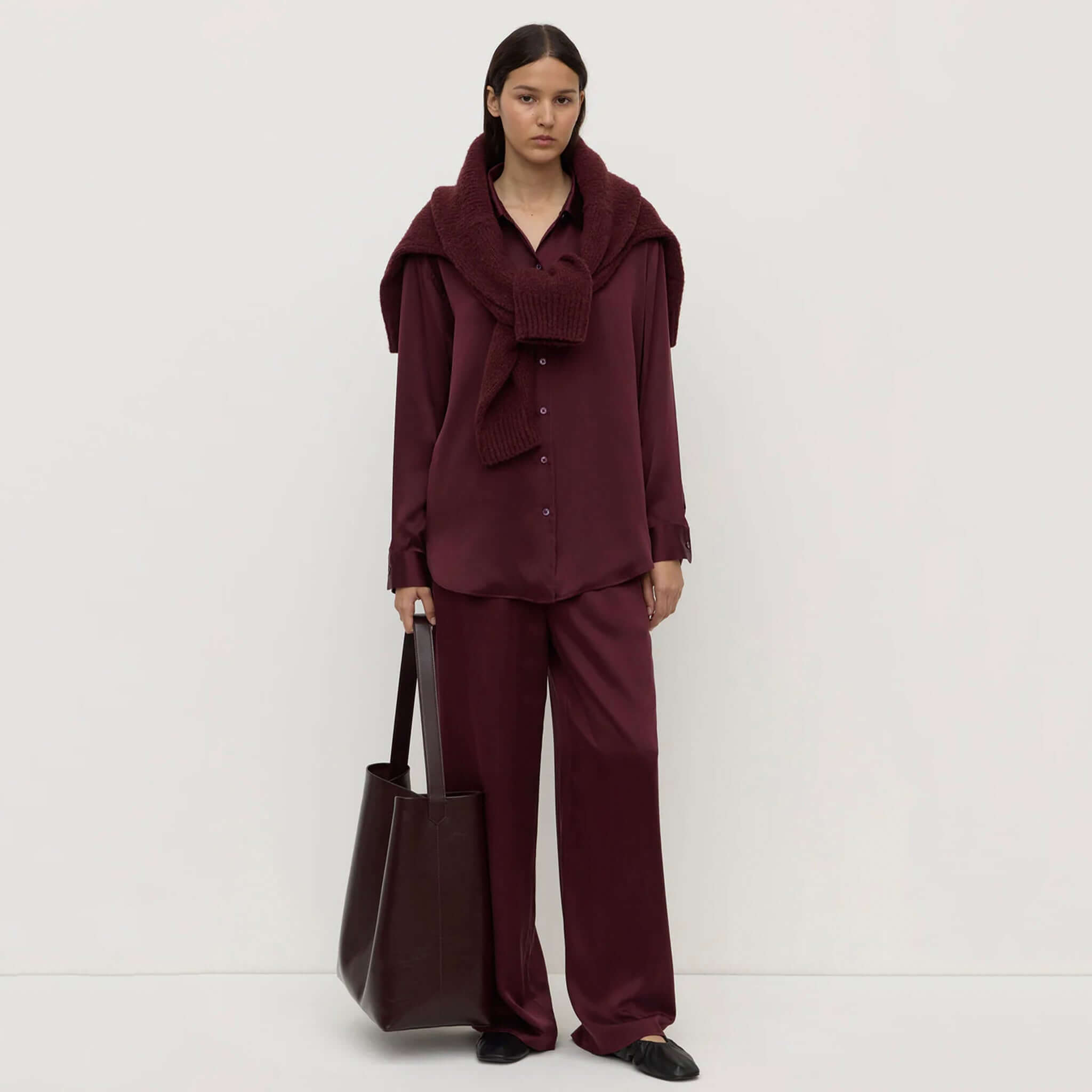 Alt Tag: Assembly Label Pippa Silk Long Sleeve Shirt - Merlot on model, relaxed 100% silk button-up with classic collar and long sleeves