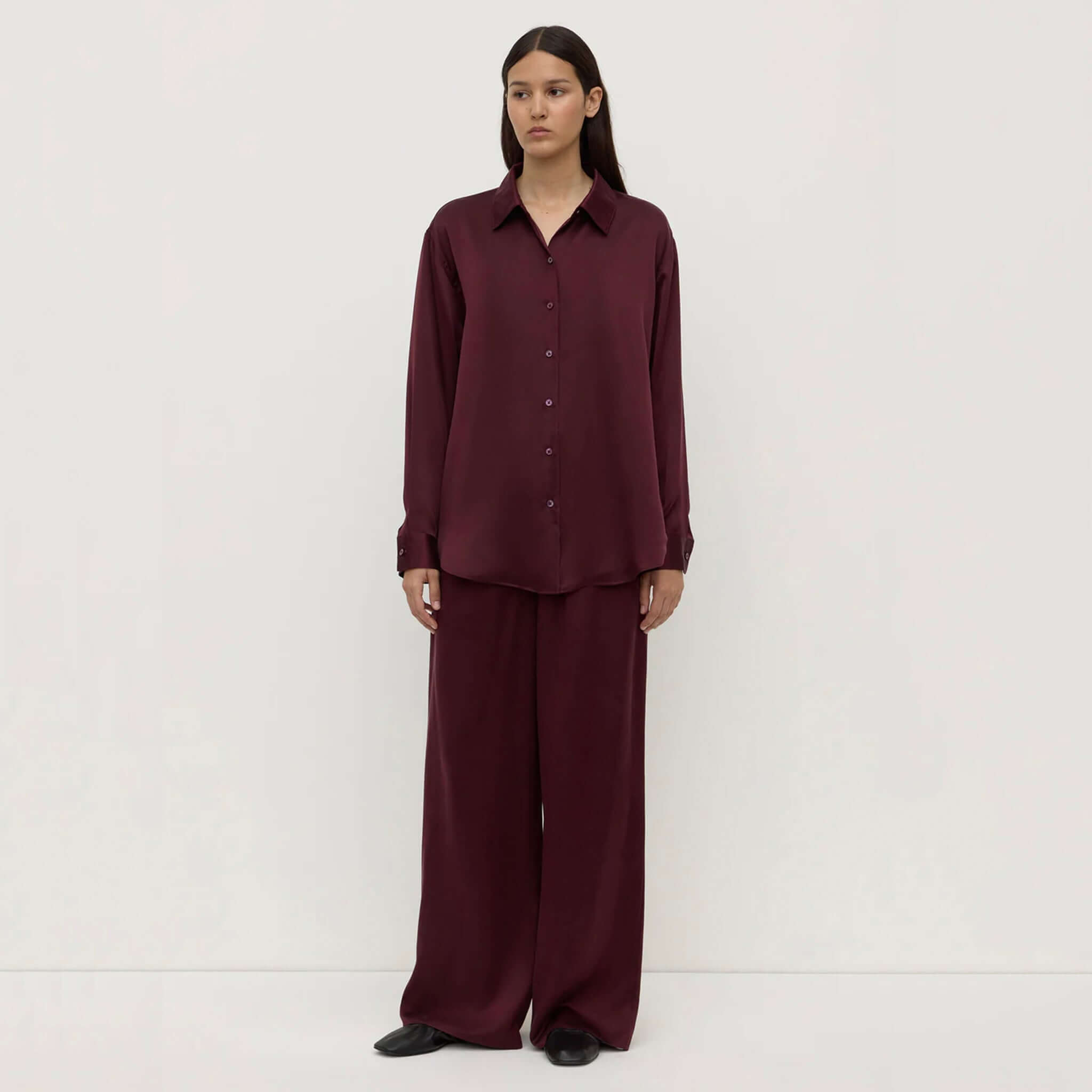 Alt Tag: Assembly Label Pippa Silk Long Sleeve Shirt - Merlot on model, relaxed 100% silk button-up with classic collar and long sleeves
