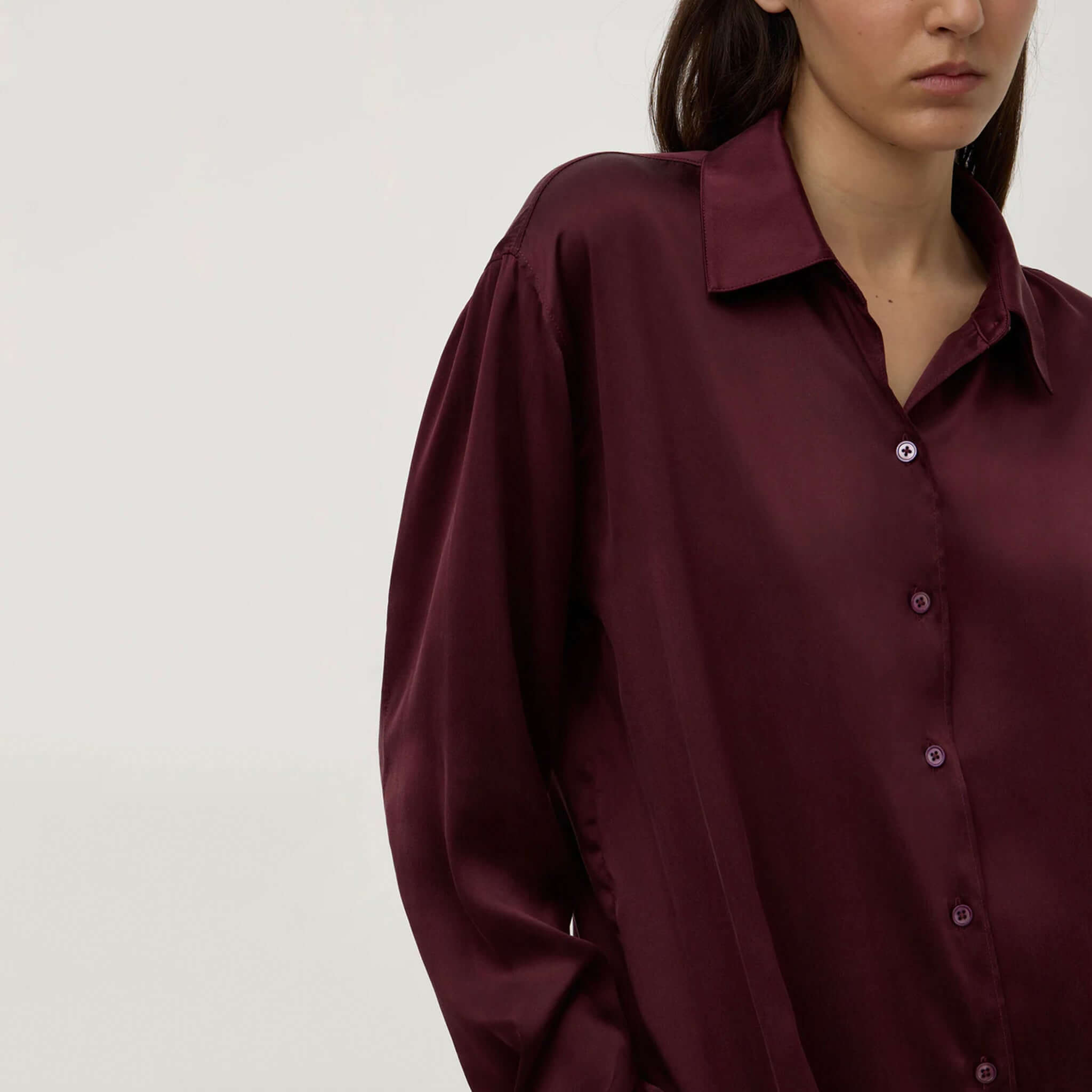 Alt Tag: Assembly Label Pippa Silk Long Sleeve Shirt - Merlot on model, relaxed fit 100% silk women’s long sleeve button-up with collar