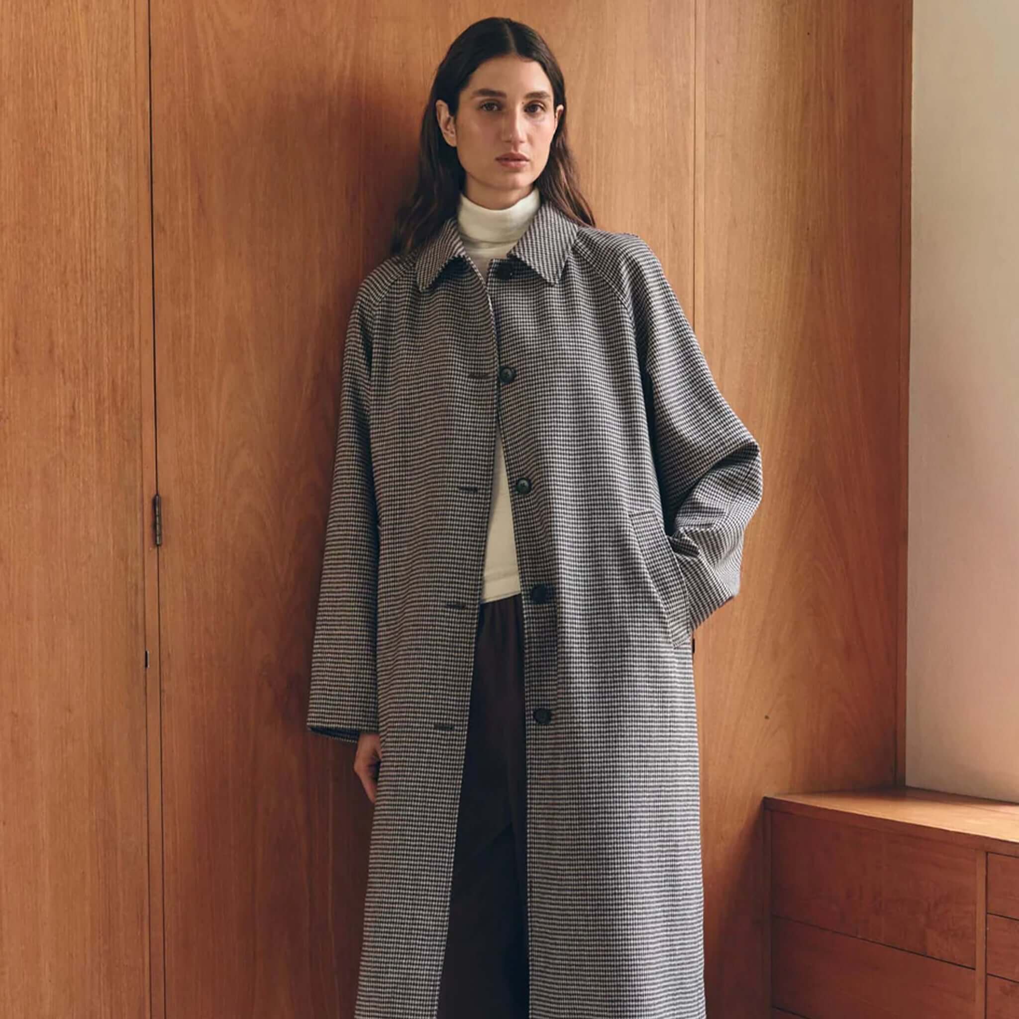 Assembly Label Solana Wool Coat - Brown Black Check worn by a model, showcasing its stylish design and check pattern.