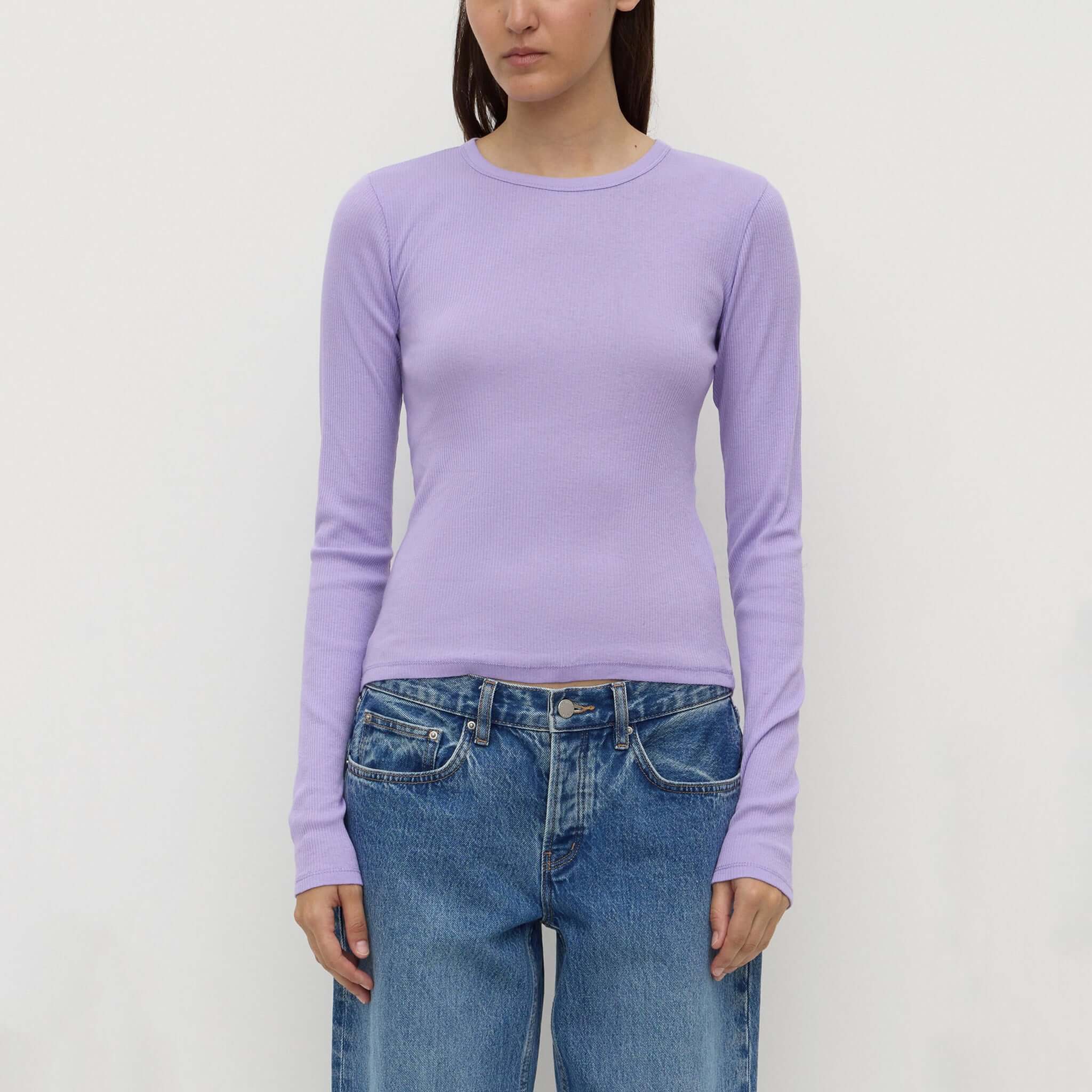Assembly Label Zali Long Sleeve Tee - Mauve worn with relaxed jeans, showcasing a classic crew neckline and long sleeves.