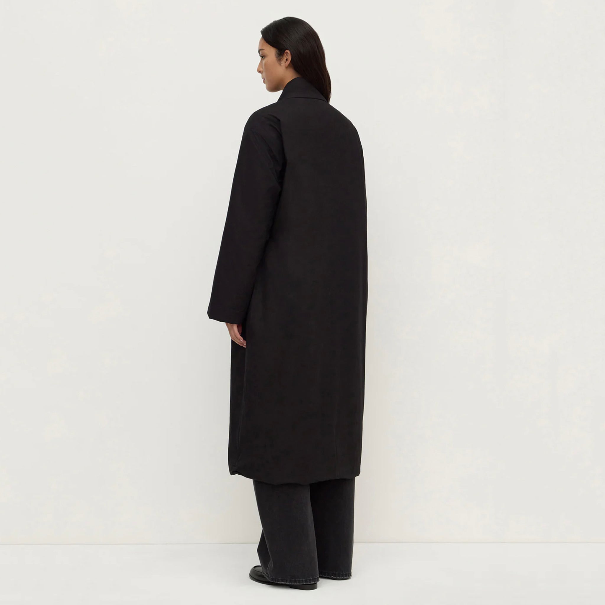 Assembly Label Zoie Padded Coat - Black back view on model