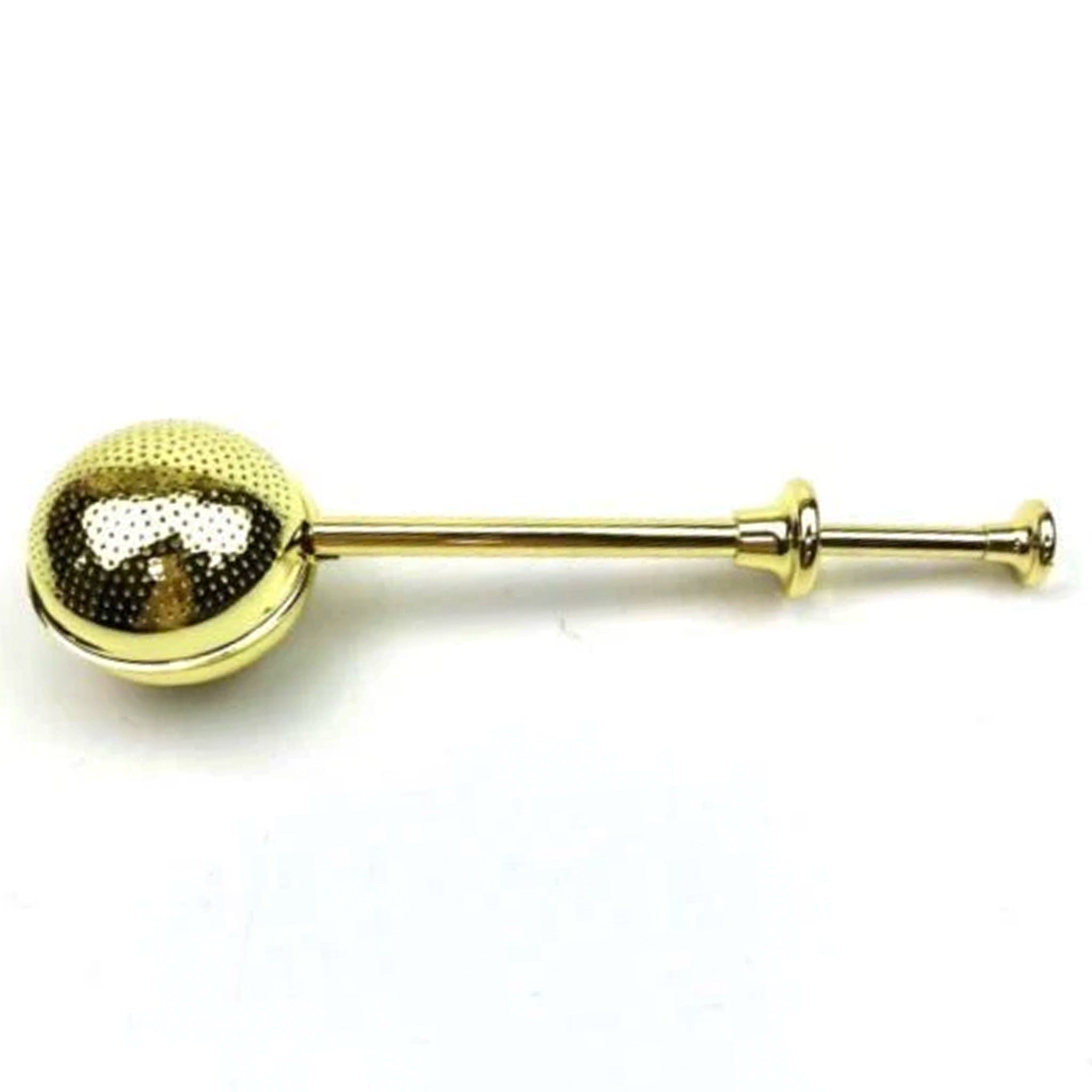 Gold tea infuser on a white background