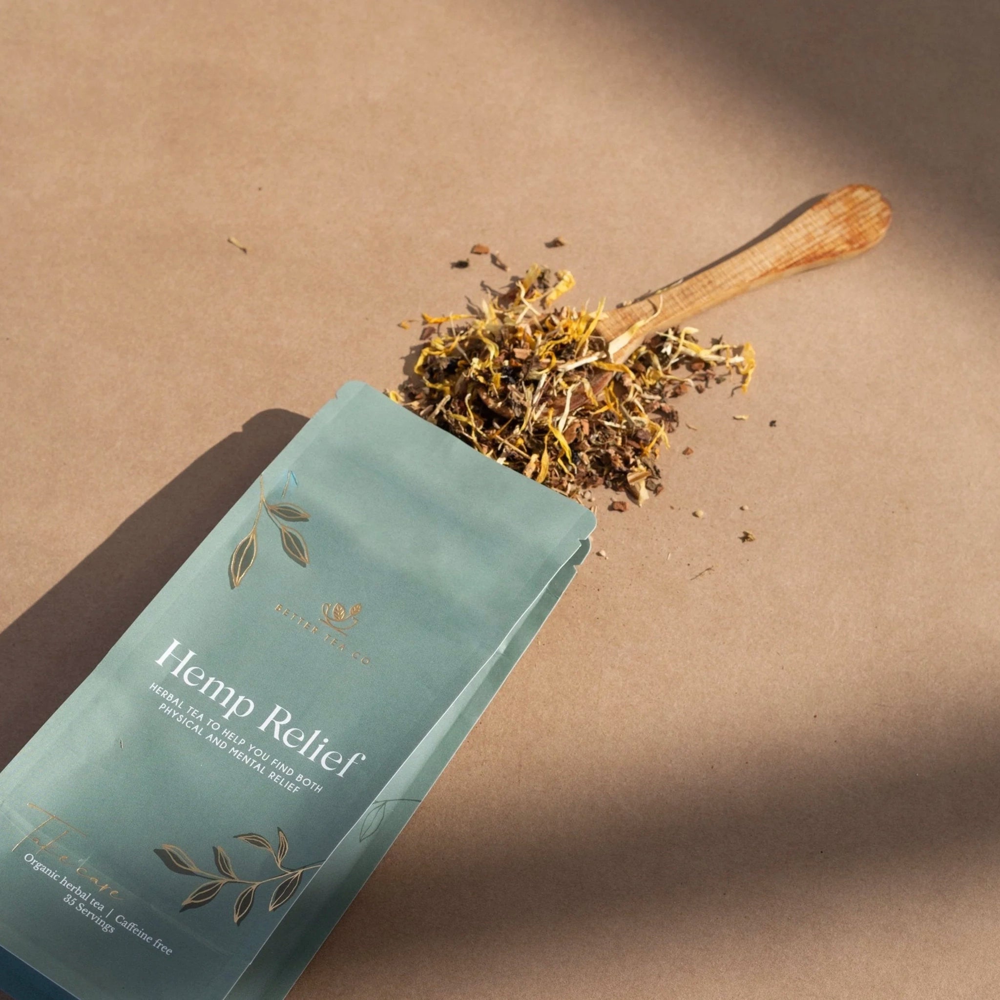Hemp Relief package with dried herbs on a brown background
