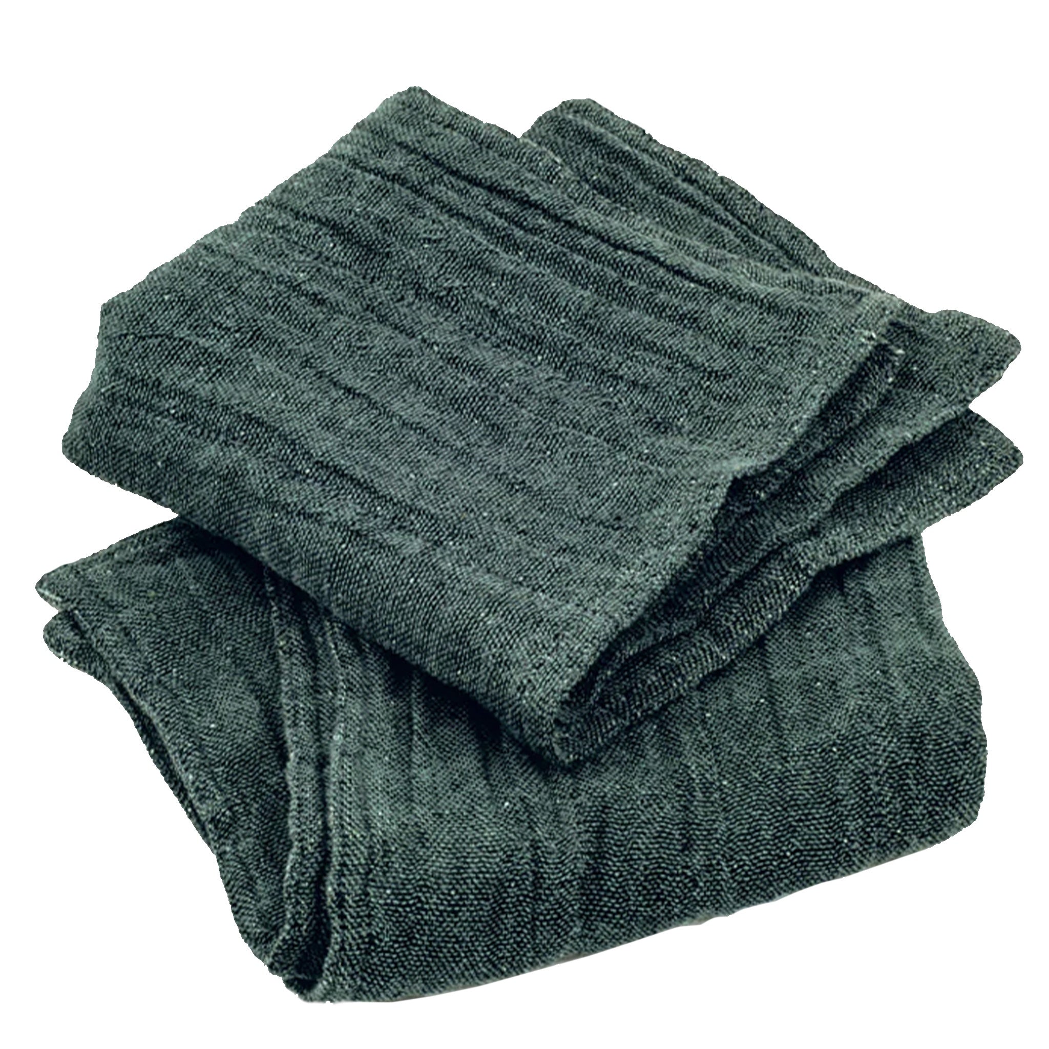 Folded dark green wash cloth on a white background