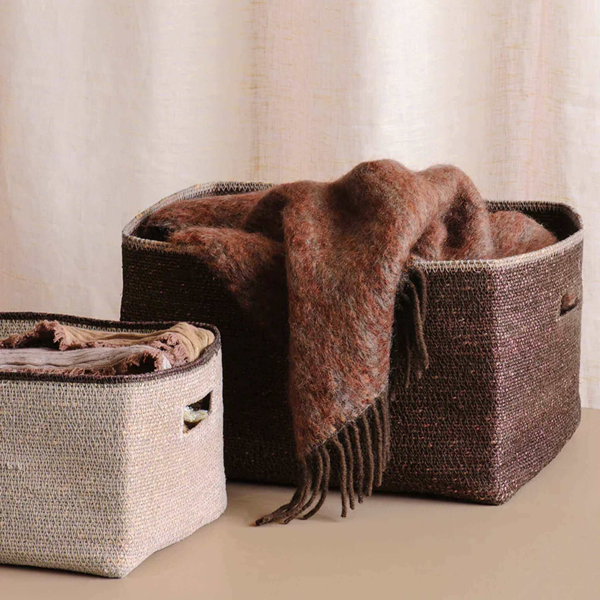 Alt Tag: Bianca Lorenne Scatola Basket - Medium Cacao rectangular seagrass storage basket in cacao with blanket, stylish shelf organizer
