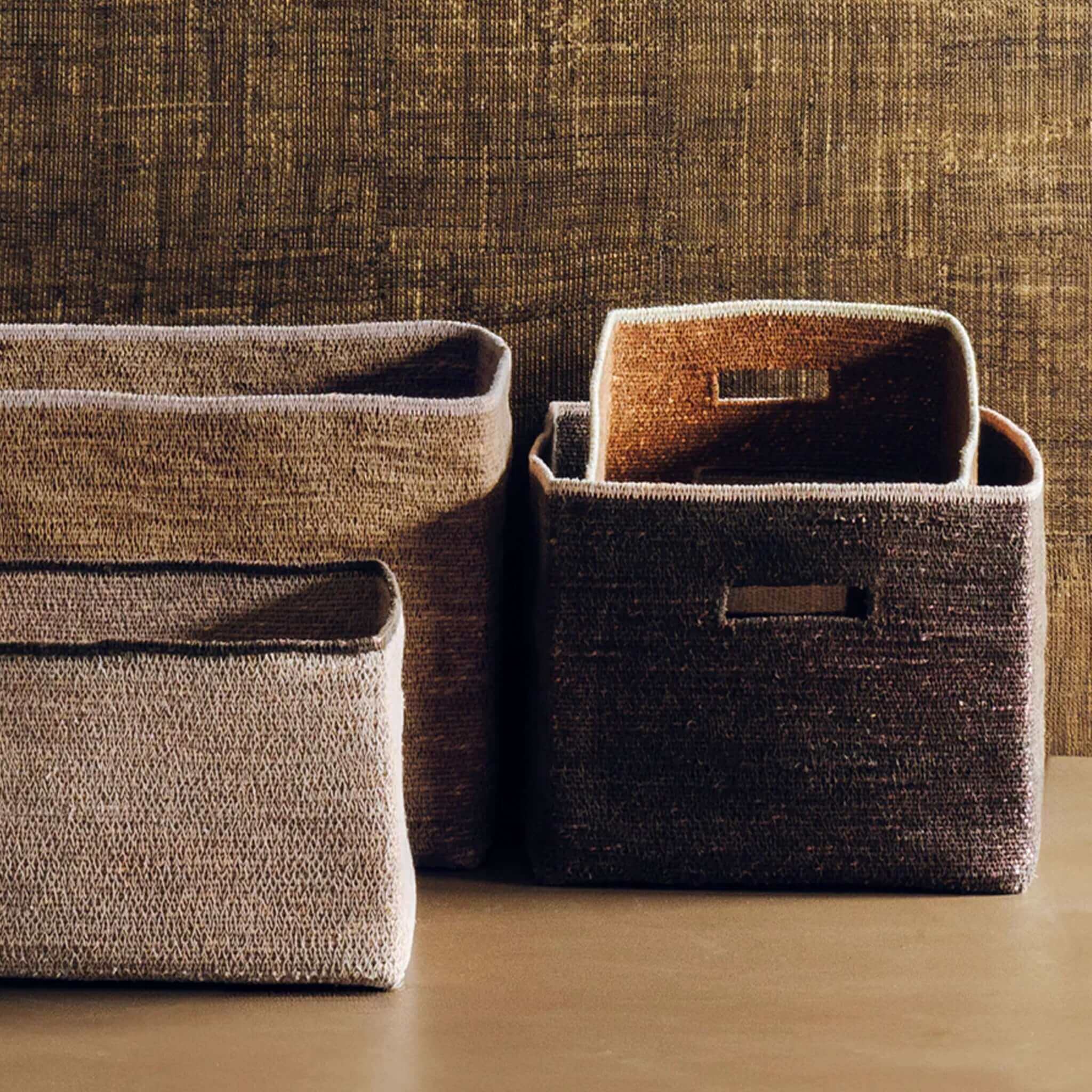 Alt Tag: Bianca Lorenne Scatola Basket - Medium Cacao rectangular seagrass storage basket set in cacao brown, stacked on shelf