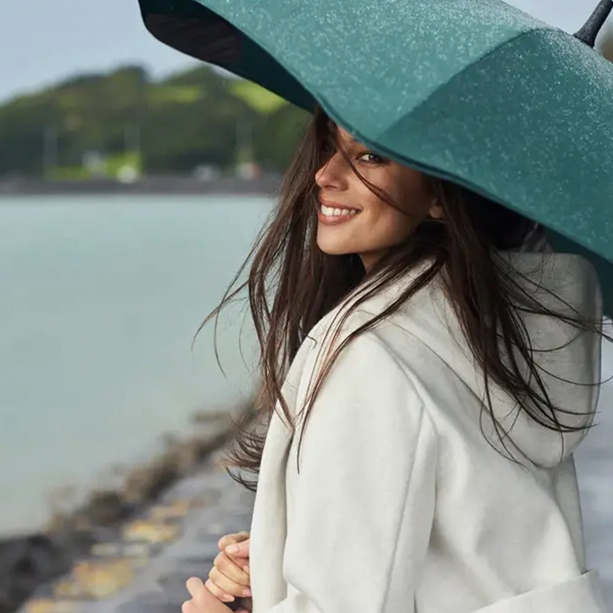 Blunt Classic Core Range Umbrella in use, showcasing design and functionality on a rainy day.
