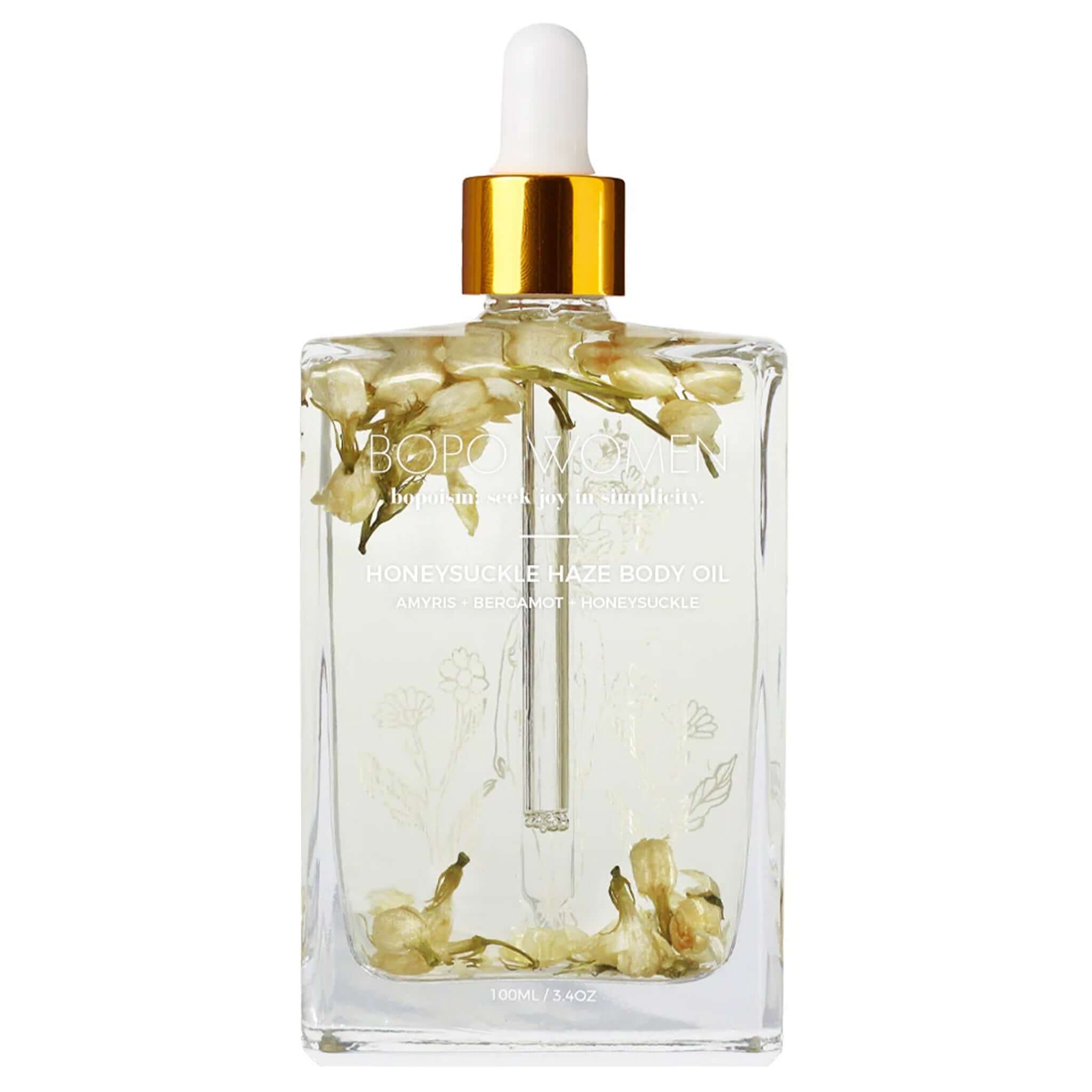 Bopo Women Body Oil - Honeysuckle Haze in a glass bottle with floral elements, 100ml size