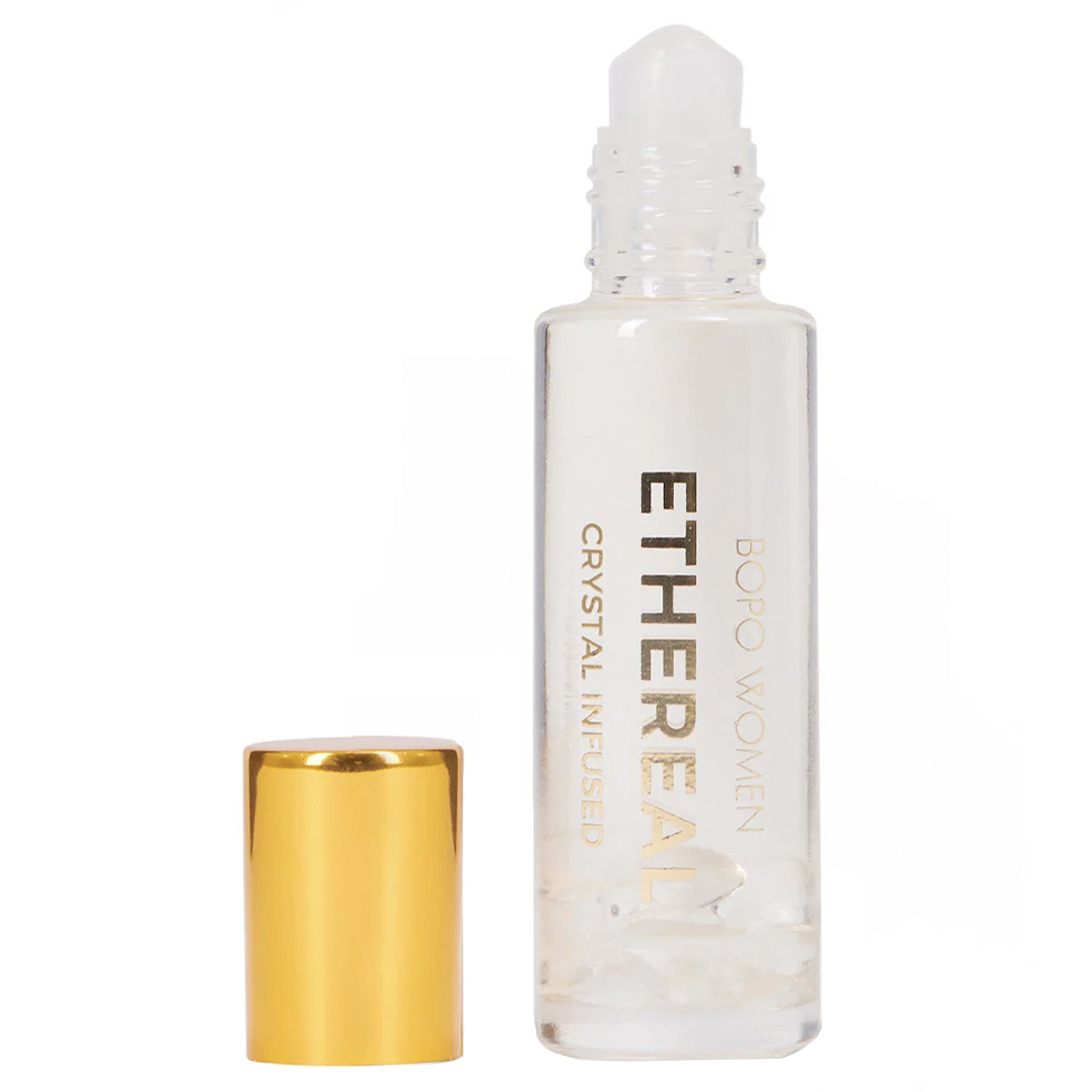 Ethereal rollerball bottle with gold cap on a white background