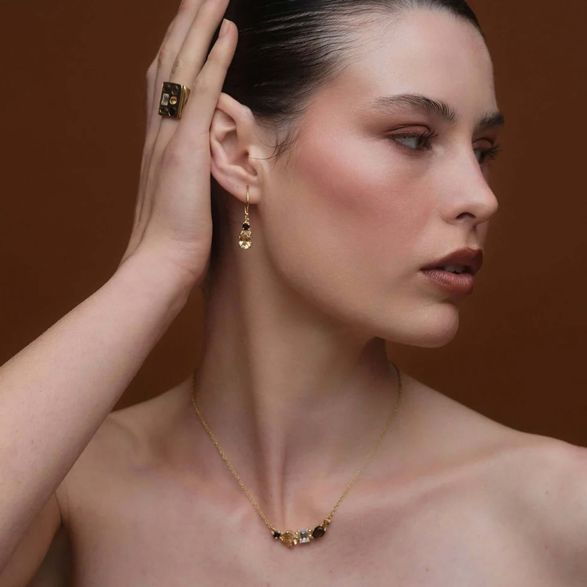 Cathy Pope Elements Collection Gold Necklace - Earth showcased on a model, featuring smoky quartz and citrine gemstones.