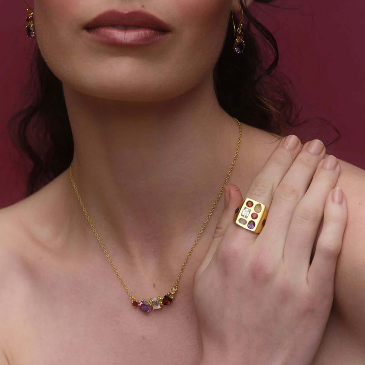 Cathy Pope Elements Collection Gold Necklace - Fire worn with matching ring, showcasing bold gemstones on a gold chain.