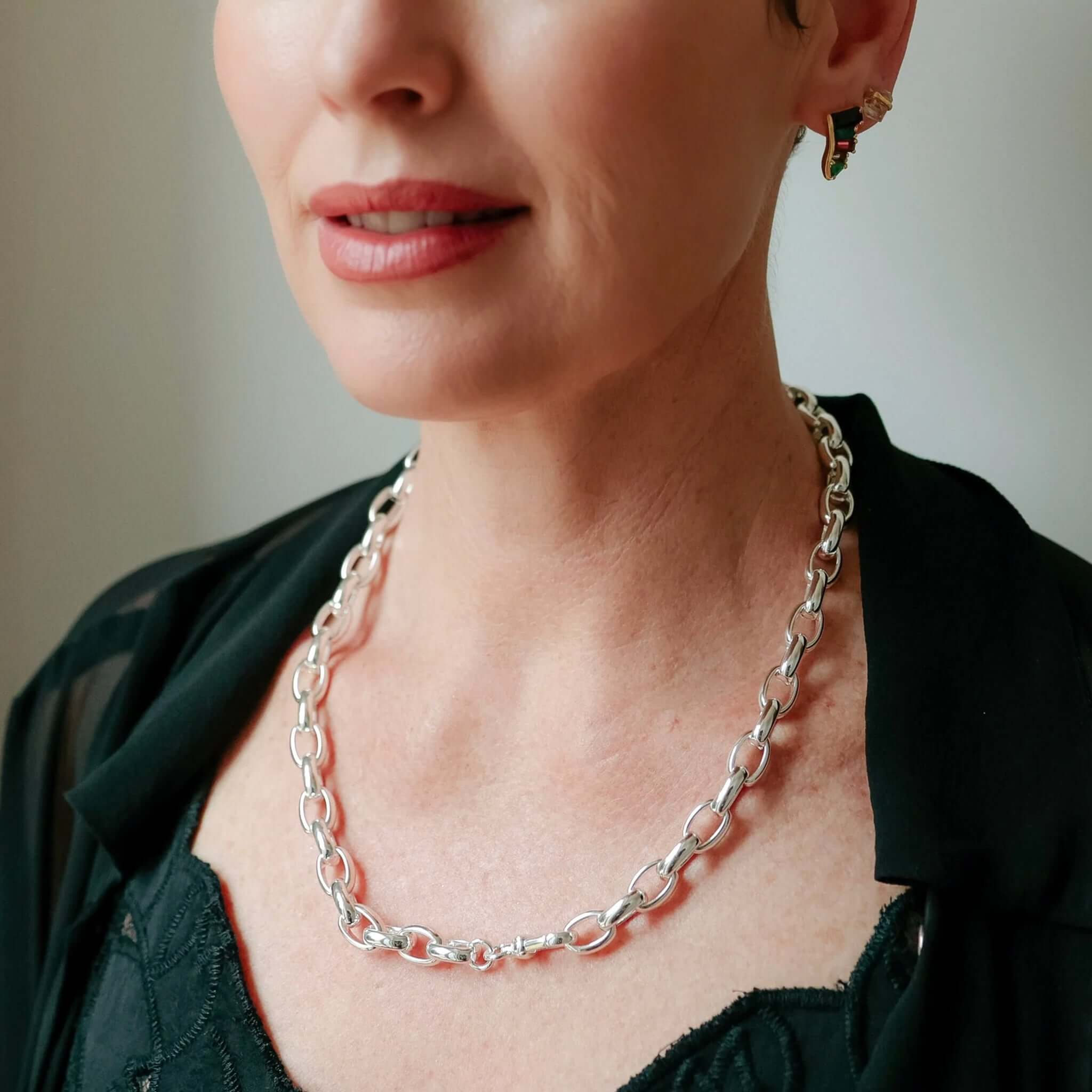 Alt Tag: Cathy Pope Empire Necklace - Silver worn on model, oversized oval chain links statement silver necklace