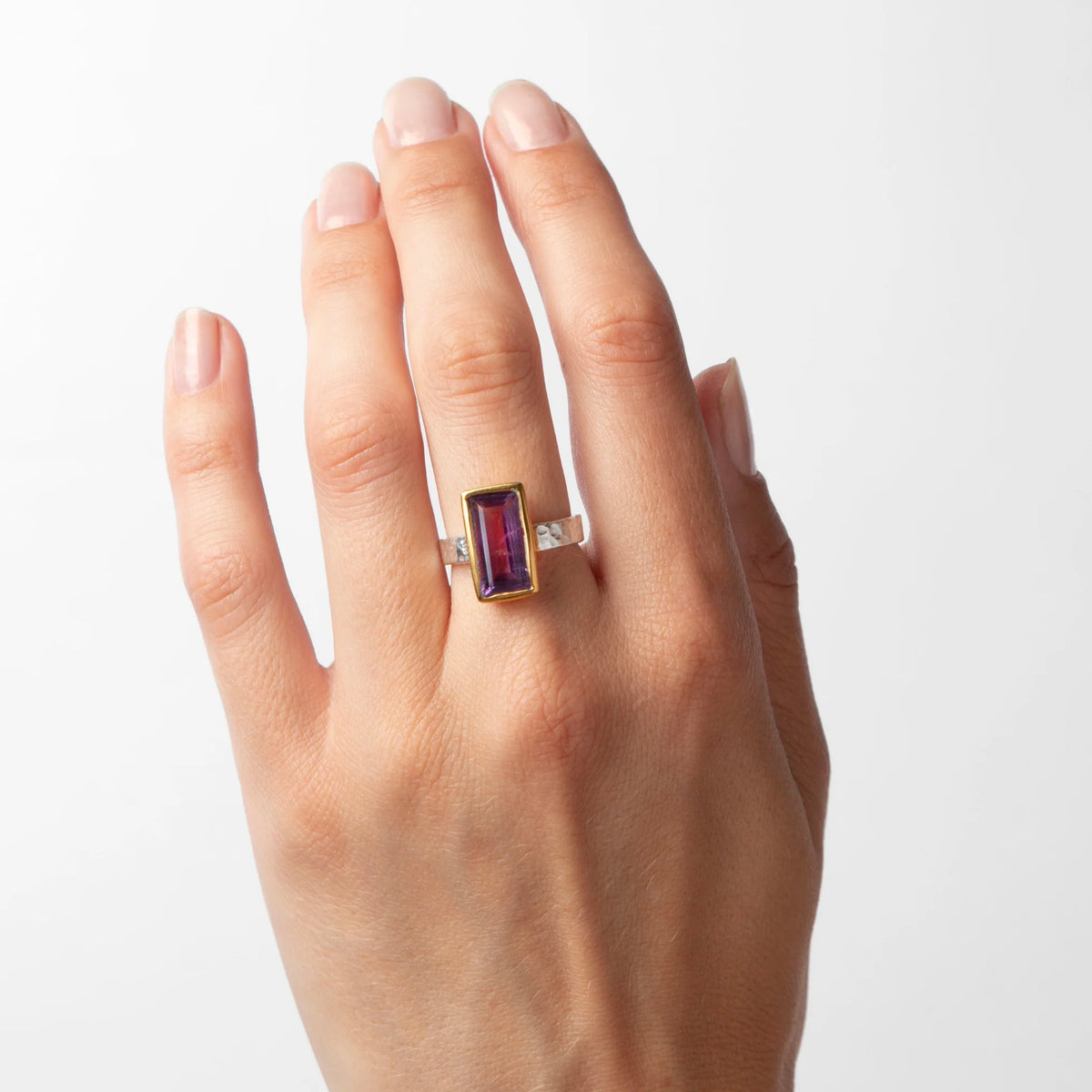 Cathy Pope Oracle Gold & Silver Ring - Amethyst worn on the finger, hand raised