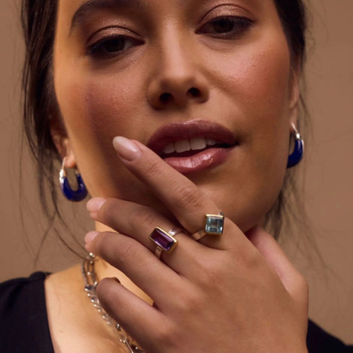Cathy Pope Oracle Gold & Silver Ring - Amethyst worn on model with a blue stone ring