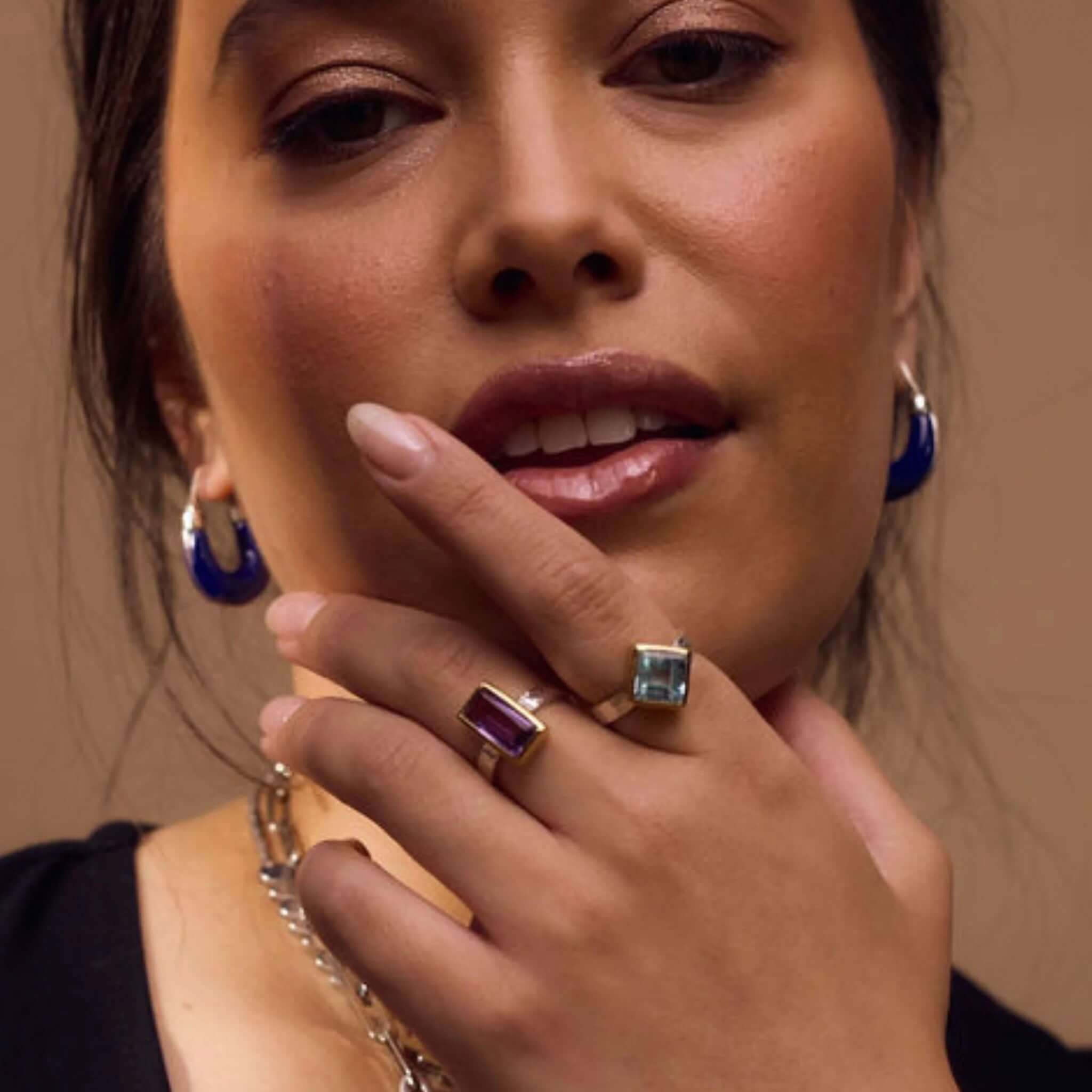 Cathy Pope Oracle Gold & Silver Ring - Amethyst worn by a model, showcasing its unique design and faceted amethyst stone.
