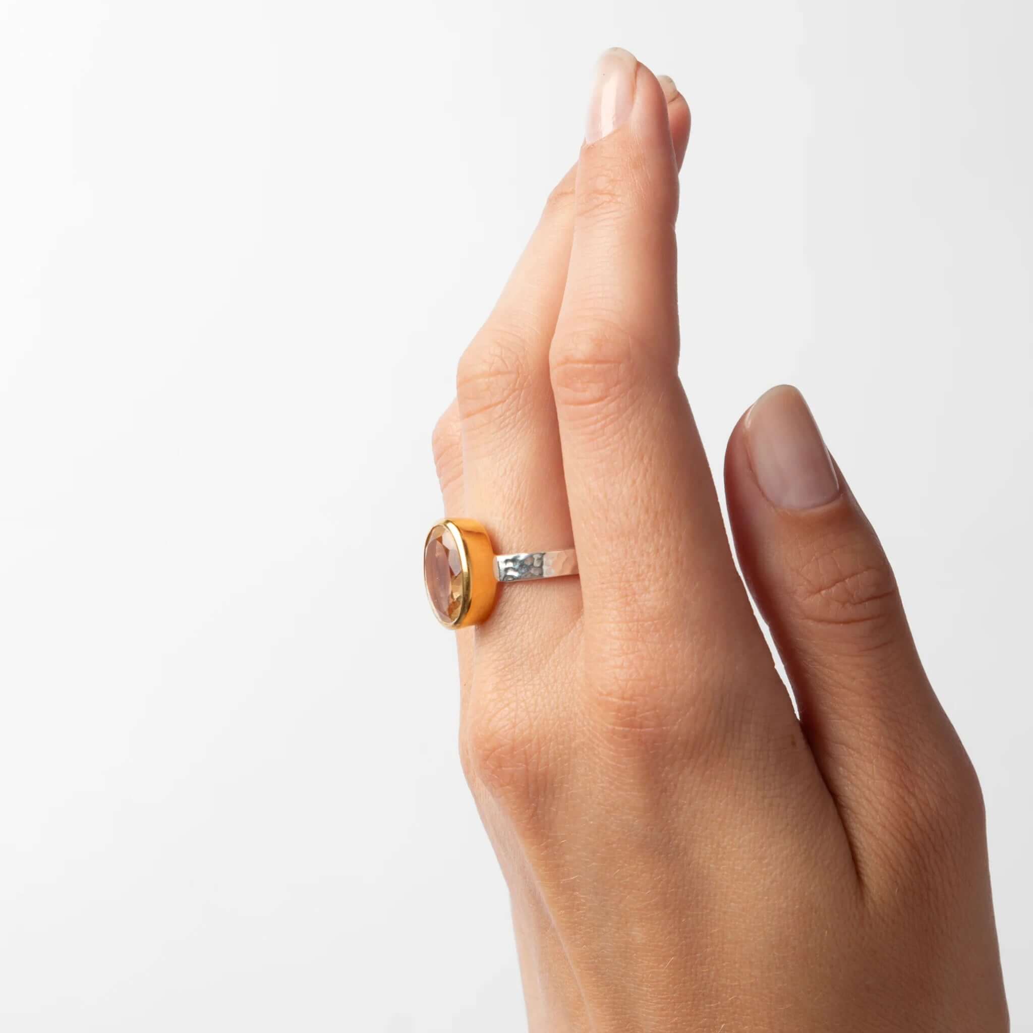 Cathy Pope Oracle Gold & Silver Ring - Citrine worn on a hand showcasing the citrine stone and hammered band.