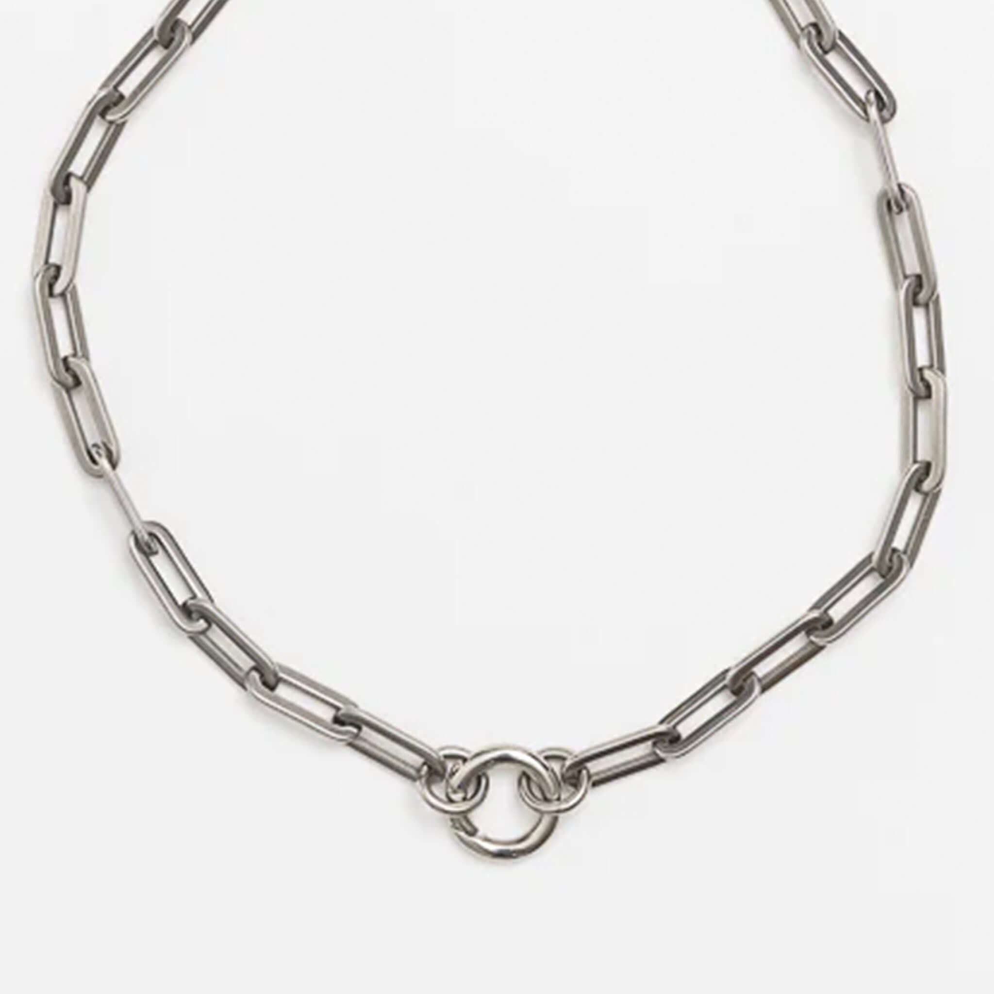 Cathy Pope Round Clasp - Stainless Steel featured in a stylish chain design, showcasing its elegant spring clasp opening.
