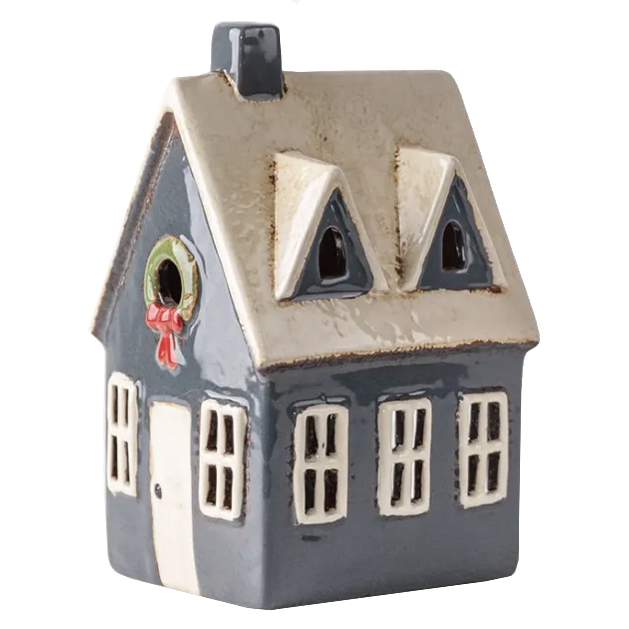 Ceramic house-shaped ornament with a decorative bow on a white background