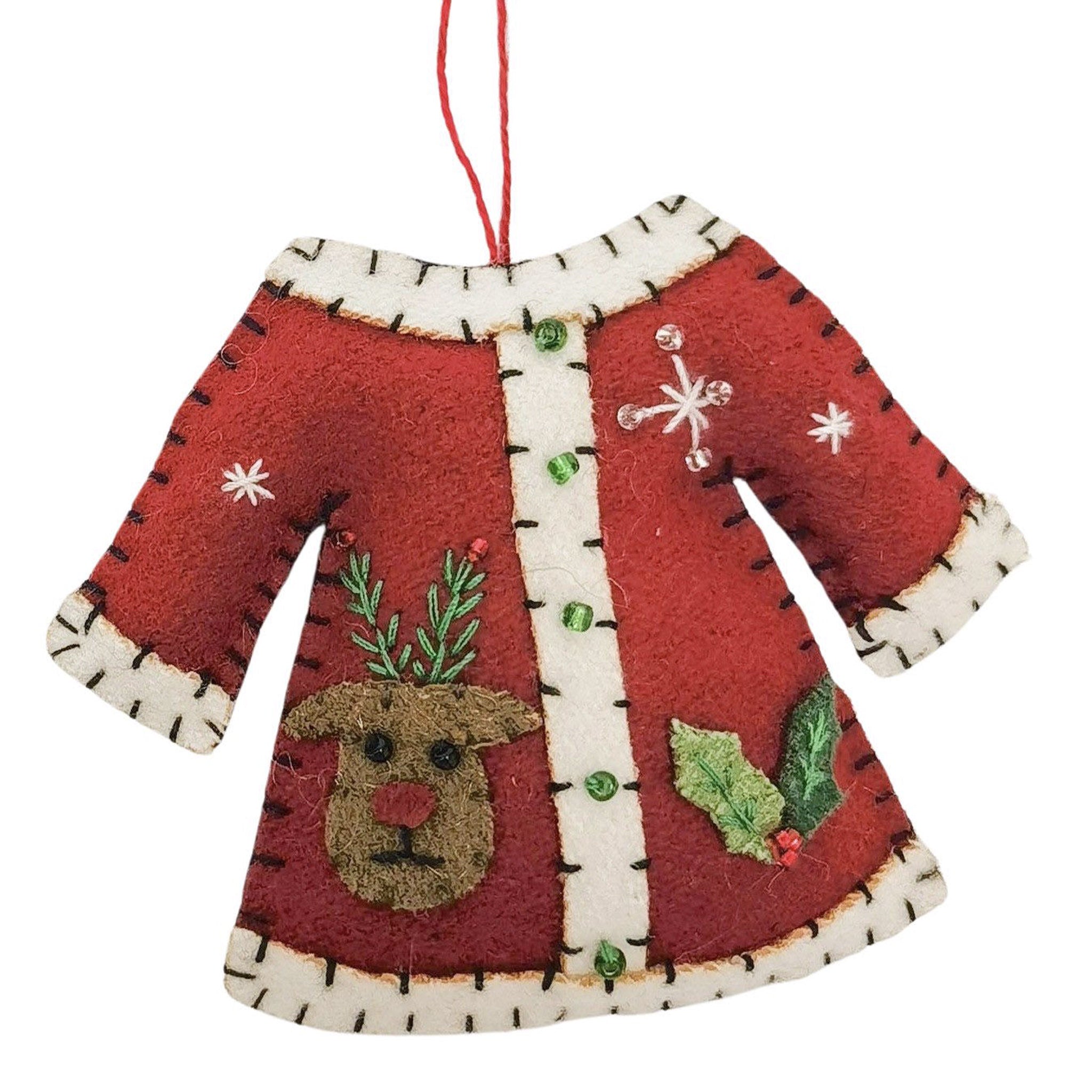 Decorative Christmas ornament shaped like a red dress with reindeer and holly design on a white background.