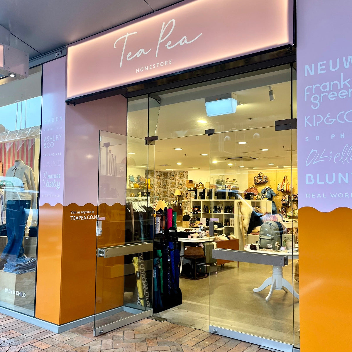 Tea Pea Wellington CBD store front with glass entrance and interior display.