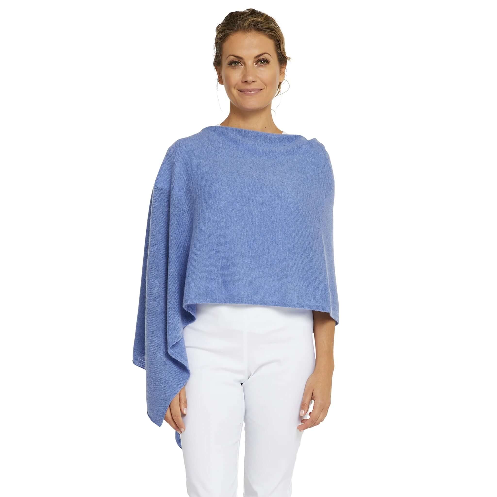 Alt Tag: Esperance & Co Classic Cashmere Topper - Cornflower Blue worn as poncho wrap, pure 2-ply cashmere travel and office layering piece