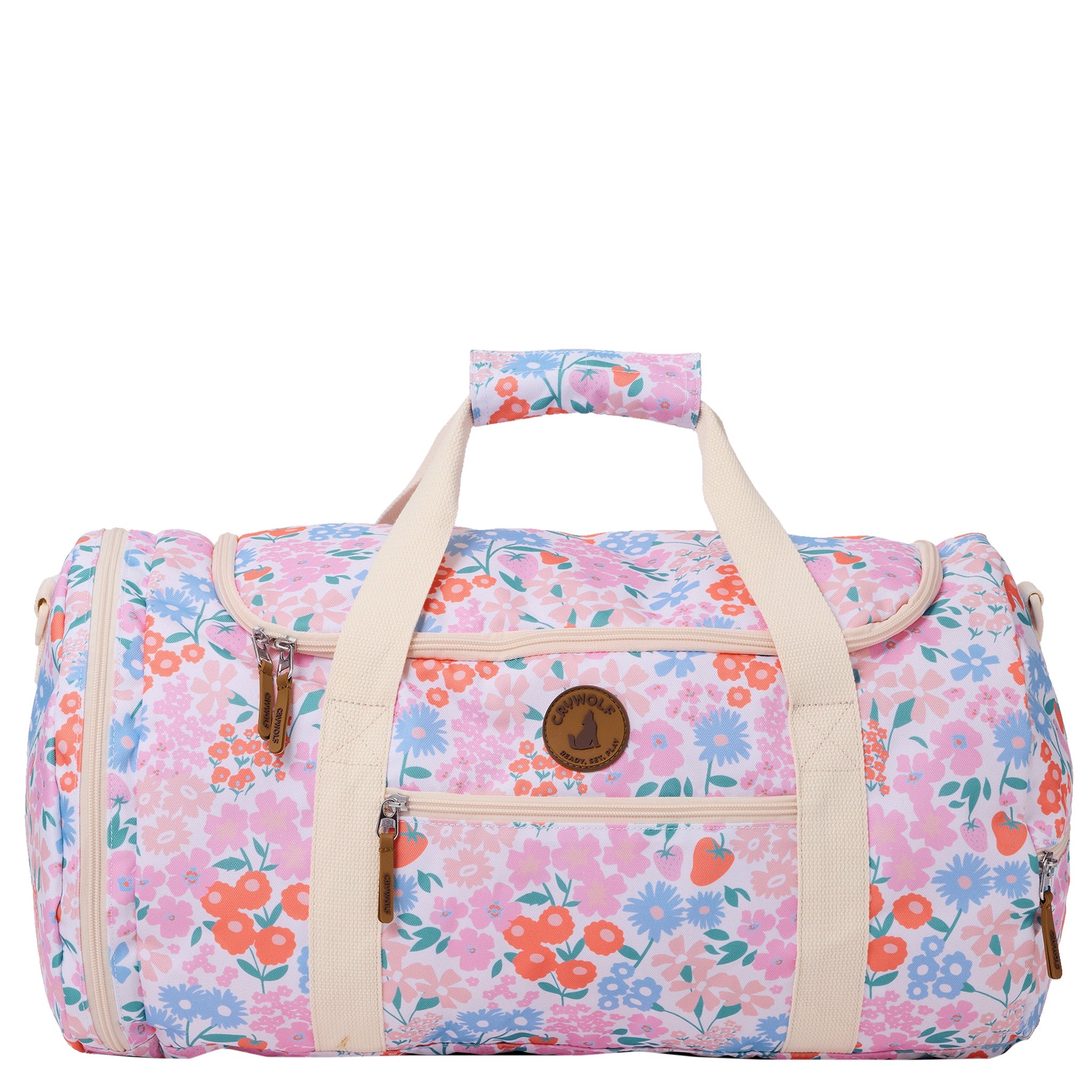 Floral patterned duffel bag with beige handles on a white background
