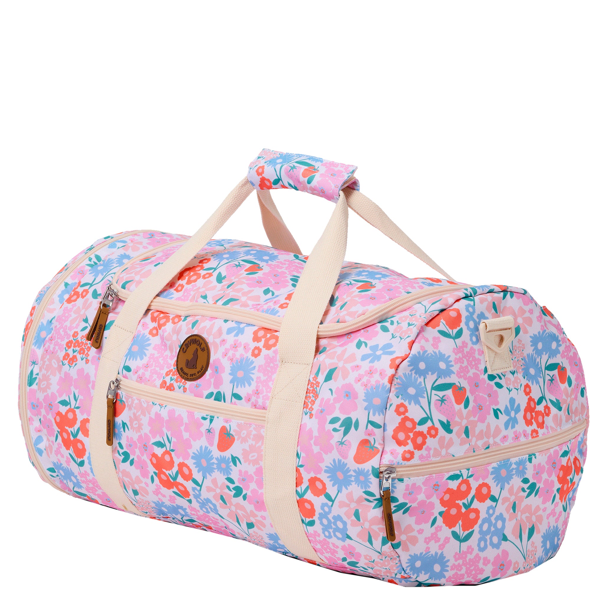 Floral patterned duffel bag with beige straps on a white background