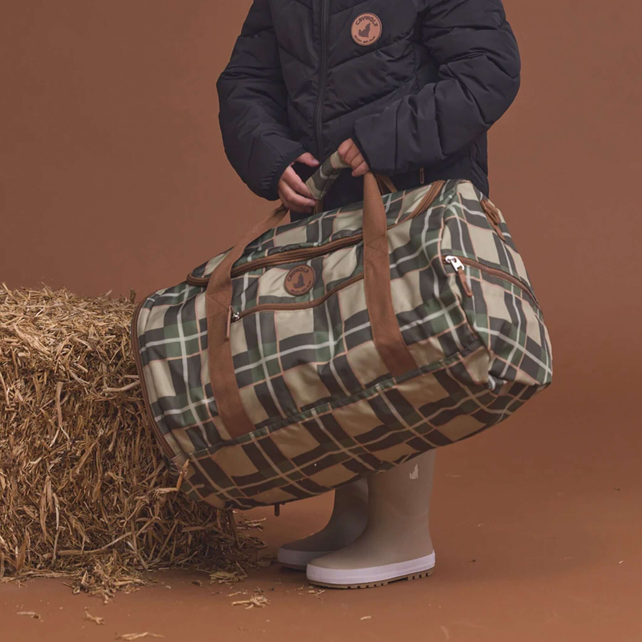 Alt Tag: Crywolf Packable Duffel Bag - Field Plaid packable duffel with wide opening, multiple compartments, weekend travel and sports bag