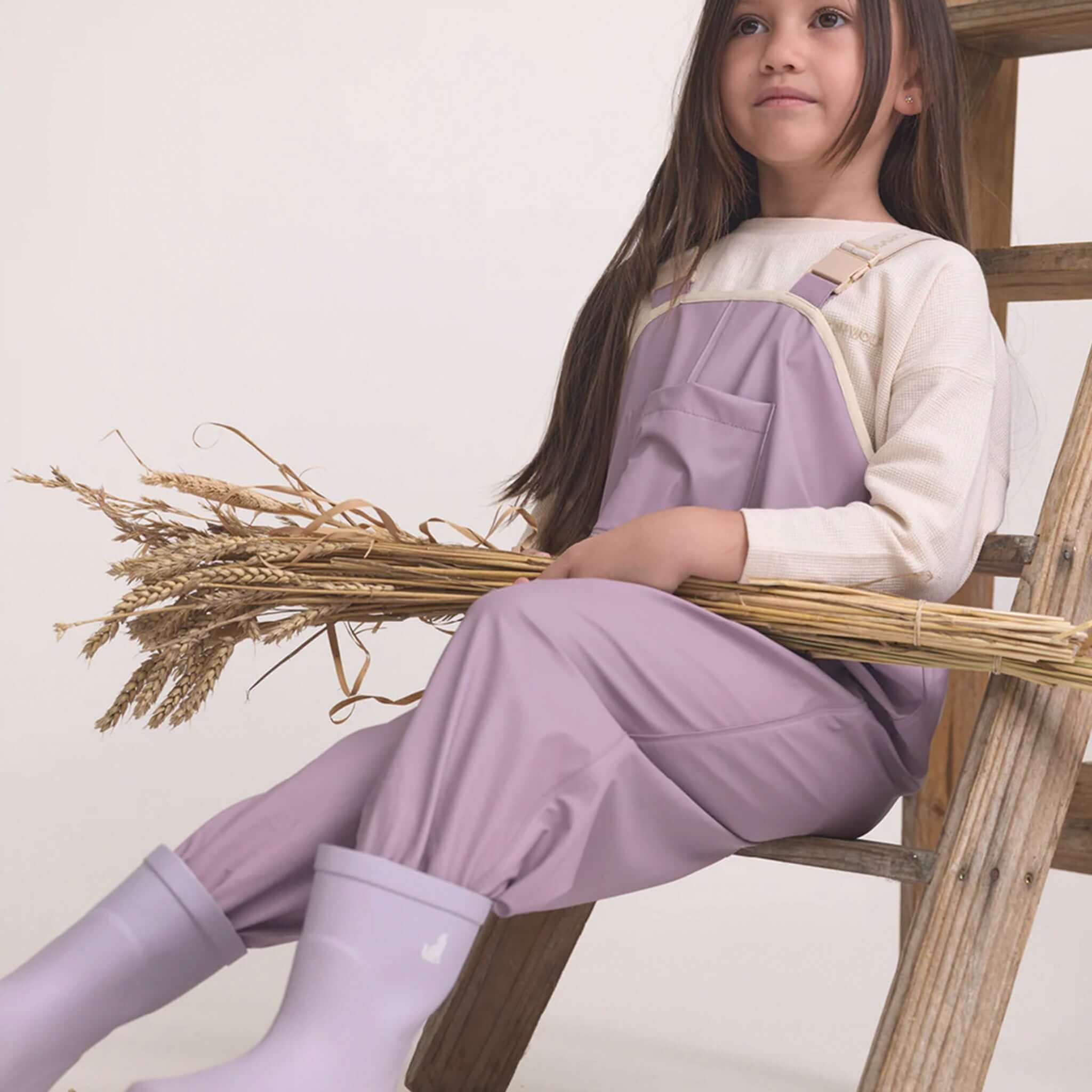 Alt Tag: Crywolf Rain Overalls - Heather kids fully waterproof adjustable rain overalls, warm and dry for outdoor play and kindy adventures