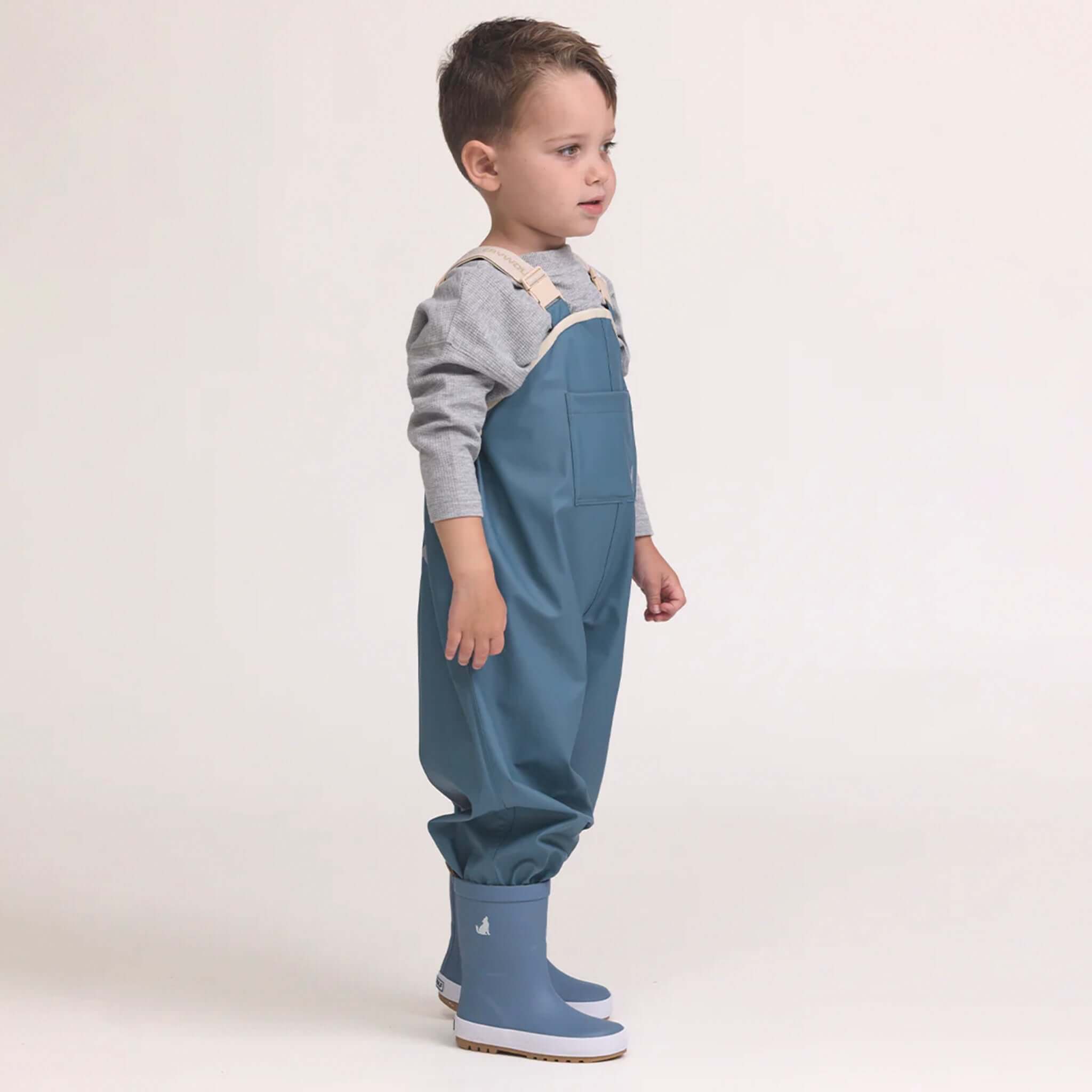 Alt Tag: Crywolf Rain Overalls - Highland Blue waterproof kids rain overalls, adjustable bib design for outdoor play